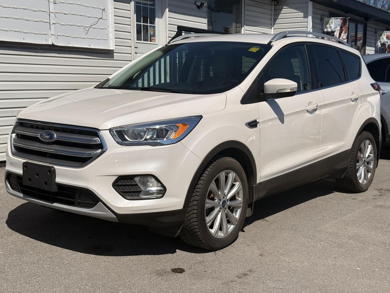 <p><strong>--TITANIUM--ONE OWNER--FULL SERVICE HISTORY--</strong></p><p>&nbsp;</p><p>Just in freshly on the lot is this CLEAN Ford Escape Titanium which is immaculate inside and out as well as fully loaded!</p><p>Remote start, power tailgate, power seats, navigation , back up camera, leather interior, heated steering wheel and oh so much more!</p><p>&nbsp;</p><p>No accidents, full dealer service history, single owner , low mileage and CERTIFIED!</p><p>&nbsp;</p><p>Book in a road test today!</p><p>&nbsp;</p><p>Need financing? Apply with us and get terms up to 72 months OAC!</p><p>&nbsp;</p><p>Damaged credit? WE CAN GET YOU APPROVED!!!</p>