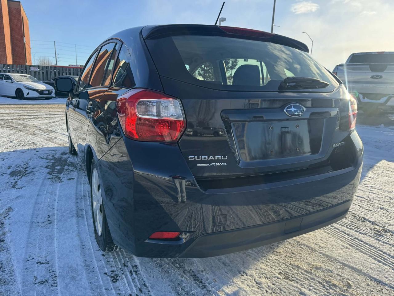 2014 Subaru Impreza AWD 5dr Hatchback Photo