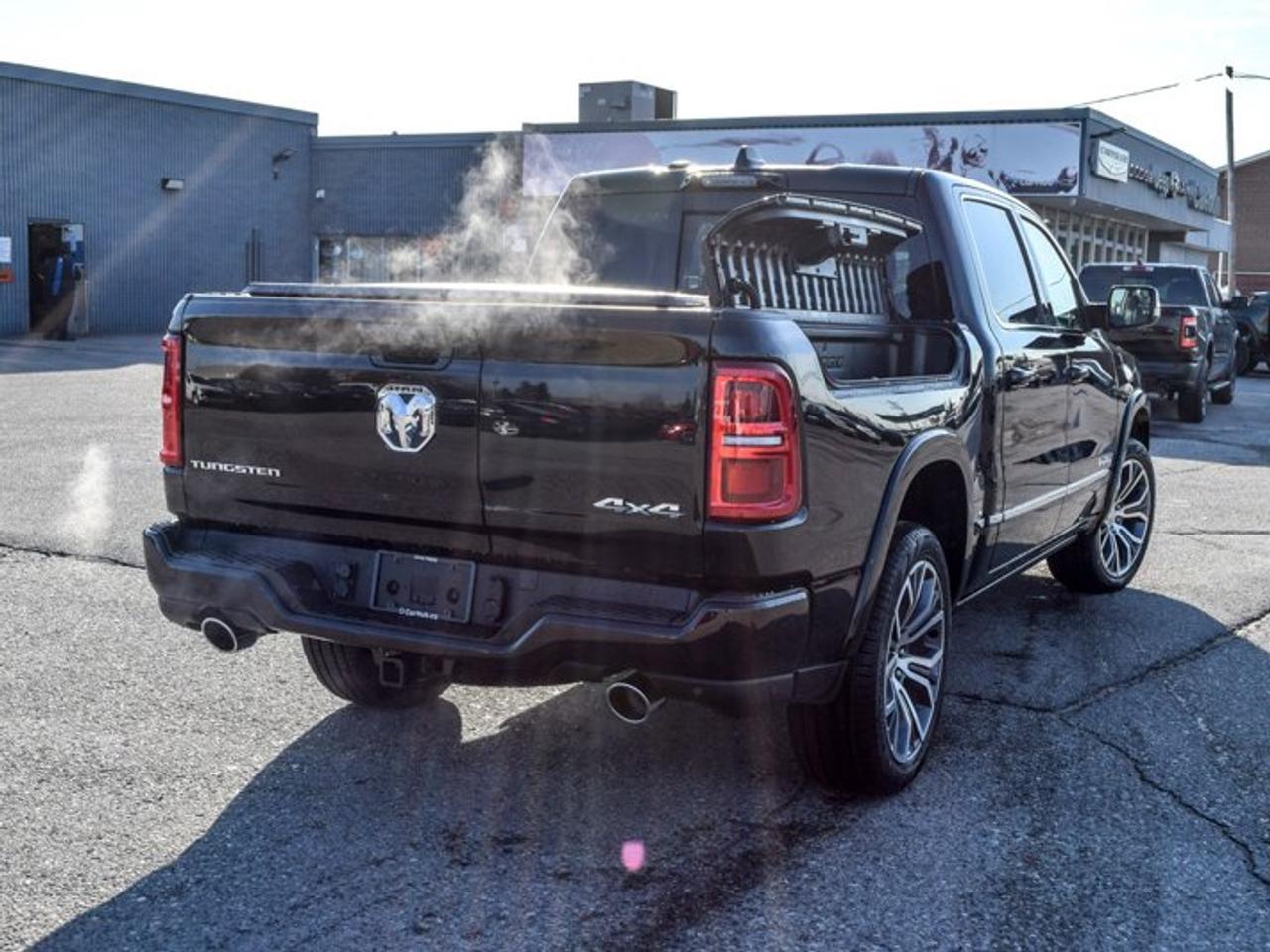 2026 RAM 1500 Tungsten 4x4 Crew Cab 5'7" Box Ram Box Pano Sunroof Hands-Free Active Driving Assist Photo