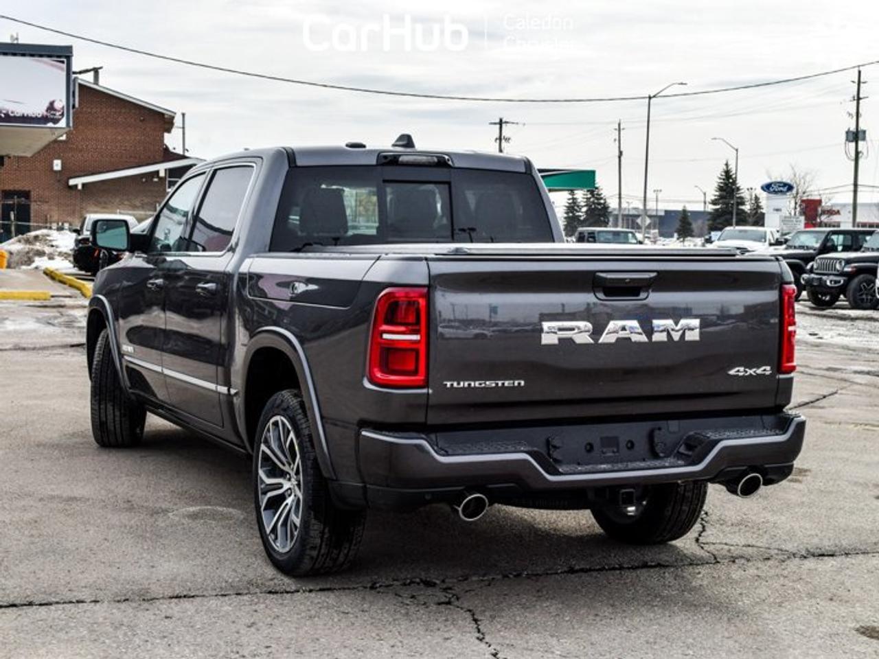 2026 RAM 1500 Tungsten 4x4 Crew Cab 5'7" Box Pano Sunroof Hands-Free Active Driving Assist Photo