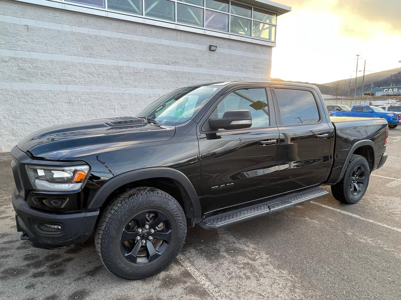<p>Looking for a rugged and capable pickup truck thats ready for anything? Check out this used 2021 RAM 1500 Rebel, available now at Smithers Toyota! This beast of a machine is built to conquer both city streets and off-road trails, boasting a powerful diesel engine and a robust 4-wheel-drive system. With only 136779KM on the odometer, this truck has plenty of life left and is ready to take on your next adventure. The Rebel trim is known for its aggressive styling and off-road prowess, making it the perfect choice for those who demand both capability and a head-turning presence.</p><p>&nbsp;</p><p>This RAM 1500 Rebel is packed with features designed to enhance your driving experience. From its comfortable interior to its advanced technology, this truck has it all. Whether youre hauling cargo, towing a trailer, or simply cruising down the highway, this RAM 1500 Rebel delivers a smooth and confident ride. Dont miss your chance to own this exceptional pickup truck. Visit Smithers Toyota today and experience the power and versatility of the 2021 RAM 1500 Rebel!</p><p>&nbsp;</p><p>Here are five standout features that make this RAM 1500 Rebel a must-have:</p><p><br><br></p><ul><li><strong>Off-Road Suspension:</strong> Conquer any terrain with confidence, thanks to the specialized off-road suspension.</li></ul><p>&nbsp;</p><ul><li><strong>Driver Selectable Rear Locking Differential:</strong> Get extra traction when you need it most, ensuring you can tackle challenging conditions.</li></ul><p>&nbsp;</p><ul><li><strong>Front Collision Warning w/Active Braking:</strong> Drive with added peace of mind, knowing this truck is equipped with advanced safety technology.</li></ul><p>&nbsp;</p><ul><li><strong>Block Heater:</strong> Perfect for those cold Canadian winters, ensuring your engine starts reliably every time.</li></ul><p>&nbsp;</p><ul><li><strong>Class IV Towing Equipment:</strong> Ready to haul your toys or equipment with ease, thanks to the included towing package.</li></ul><p><br><br></p><p><strong><em>Powered by AutoIntelligence&trade;</em></strong><br>Vehicle information has been generated using artificial intelligence and is provided for informational purposes only. While efforts are made to ensure accuracy, please confirm all details directly with the dealer.</p><p>&nbsp;</p>