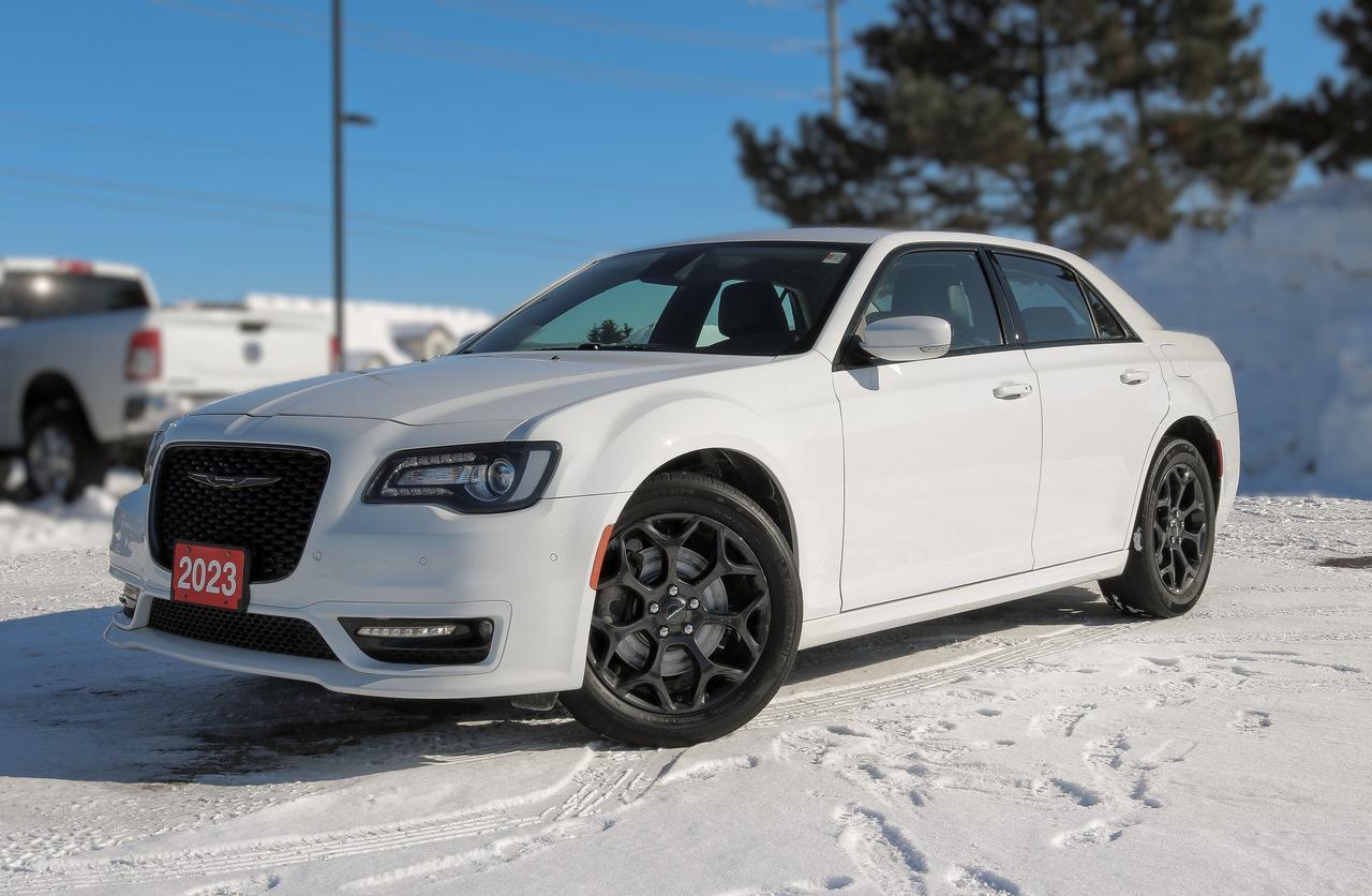 NAVIGATION, BACKUP CAMERA, BLUETOOTH, BLIND SPOT, REMOTE START, ALPINE PREMIUM AUDIO, AND MORE !!!

Previous daily rental

Take a look at our 2023 Chrysler 300 Touring L AWD Sedan in Bright White to discover a legendary street machine! Motivated by a 3.6 Litre Pentastar V6 delivering 292hp to an 8 Speed Automatic transmission so you can drive with dominating authority. The Touring suspension helps you take on your days with confident handling, and this All Wheel Drive sedan returns approximately 8.7L/100km on the highway. Fierce and full-sized, our 300 can help raise your profile with LED lighting, SRT fog lamps, 20-inch Black Noise wheels, a performance front bumper, bright-tipped dual exhaust outlets, and a black chrome grille.

Our Touring L cabin inspires you to enjoy the road while taking advantage of heated leather power front seats, a heated leather steering wheel, dual-zone automatic climate control, keyless access/ignition, remote start, and cruise control. Intelligent technology is standard for better infotainment with an 8.4-inch touchscreen, Android Auto&reg;, Apple CarPlay&reg;, WiFi compatibility, voice control, Bluetooth&reg;, and a six-speaker audio system.

You can also move through your world with less worry, knowing Chrysler supplies advanced driver assistance from front/rear parking sensors, blind-spot monitoring, rear cross-path detection, a rearview camera, tire pressure monitoring, and more. Aggressive yet refined, our 300 Touring L is a real-world winner! Save this Page and Call for Availability. We Know You Will Enjoy Your Test Drive Towards Ownership! 

Bustard Chrysler prides ourselves on our expansive used car inventory. We have over 100 pre-owned units in stock of all makes and models, with the largest selection of pre-owned Chrysler, Dodge, Jeep, and RAM products in the tri-cities. Our used inventory is hand-selected and we only sell the best vehicles, for a fair price. We use a market-based pricing system so that you can be confident youre getting the best deal. With over 25 years of financing experience, our team is committed to getting you approved - whether you have good credit, bad credit, or no credit! We strive to be 100% transparent, and we stand behind the products we sell. For your peace of mind, we offer a 3 day/250 km exchange as well as a 30-day limited warranty on all certified used vehicles.