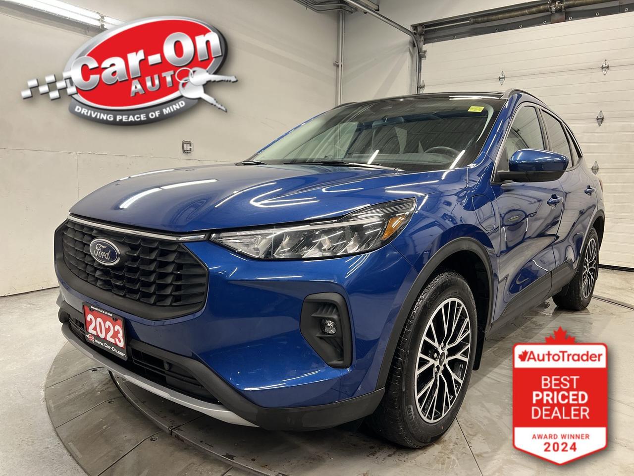 LOADED PLUG-IN HYBRID W/ 210HP!!! Leather-trimmed seats, panoramic sunroof, heated seats & steering, massive 13.3-inch touchscreen w/ Android Auto/ Apple CarPlay, remote start, navigation, 18-inch alloys, adaptive cruise control, blind spot monitor, rear cross-traffic alert, pre-collision system, lane departure warning, backup camera, w/ front & rear park sensors, dual-zone climate control, keyless entry, hitch w/ push start, power liftgate, power mirrors, power windows, power locks, automatic headlights w/ auto highbeams, Bluetooth and Sirius XM!!