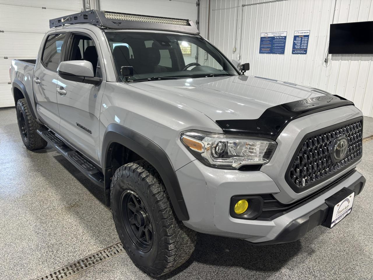 <p data-start=130 data-end=179><span data-start=130 data-end=179>Rugged Capability Meets Everyday Comfort</span></p><p data-start=181 data-end=641>Take on tough terrain and daily drives with confidence in this <span data-start=244 data-end=302>2019 Toyota Tacoma SR5 4WD</span>! Powered by a proven <span data-start=329 data-end=347>3.5L V6 engine</span> paired with a smooth <span data-start=369 data-end=403>6-speed automatic transmission</span>, this Tacoma delivers strong performance and dependable capability. The <span data-start=476 data-end=490>4WD system</span> provides added traction when conditions demand it, while the <span data-start=552 data-end=564>long bed</span> offers excellent versatility for hauling tools, toys, or weekend gear.</p><p data-start=643 data-end=1073>Step inside the spacious <span data-start=668 data-end=682>Double Cab</span> and enjoy a comfortable, well-equipped interior built for both work and play. Features include <span data-start=783 data-end=808>premium cloth seating</span>, a <span data-start=812 data-end=847>touchscreen infotainment system</span> with <span data-start=853 data-end=880>Bluetooth connectivity</span>, USB ports, and a <span data-start=904 data-end=921>backup camera</span> for added convenience and confidence. Power windows and locks, cruise control, and air conditioning ensure a comfortable ride no matter the season.</p><p> </p><p data-start=1075 data-end=1474>Built with Toyotas legendary durability, the Tacoma SR5 also stands out with bold styling and functional design. <span data-start=1194 data-end=1210>Alloy wheels</span>, <span data-start=1212 data-end=1226>fog lights</span>, and an integrated bed with tie-down cleats add both form and function. Whether youre tackling job sites, navigating winter roads, or heading off on your next adventure, this <span data-start=1403 data-end=1442>2019 Tacoma SR5 Double Cab Long Bed</span> is ready to handle it all.</p><p>At Sisson Auto, we make buying a vehicle a seamless and stress-free experience. Our transparent pricing eliminates haggling and eliminates any hidden fees. To give you peace of mind, we offer a 3-day/600 km No-Hassle Return Policy, a 30-day exchange privilege, minimum warranties with 24-hour roadside assistance, a check for safety recalls, and a complimentary CarFax history report. Plus, home delivery is free within 200 km. Dealer permit #5471. <o:p></o:p></p><p data-start=1075 data-end=1474> </p><p>** This description was written by AI based on information provided about the vehicle. AI can sometimes produce incorrect information. Please confirm all details with the dealership.<o:p></o:p></p>