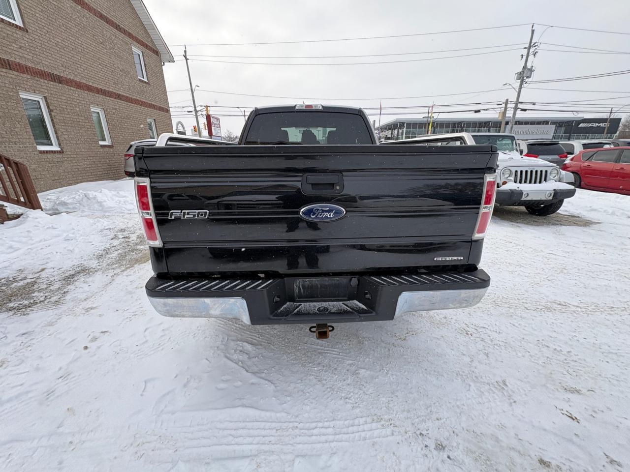 2014 Ford F-150 4WD SuperCab 163" XLT, Low KM, with Safety and 1 year $5000 per claim Warranty Photo