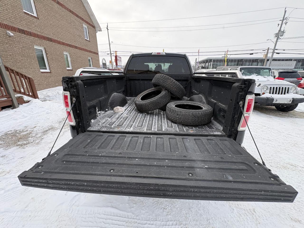 2014 Ford F-150 4WD SuperCab 163" XLT, Low KM, with Safety and 1 year $5000 per claim Warranty Photo