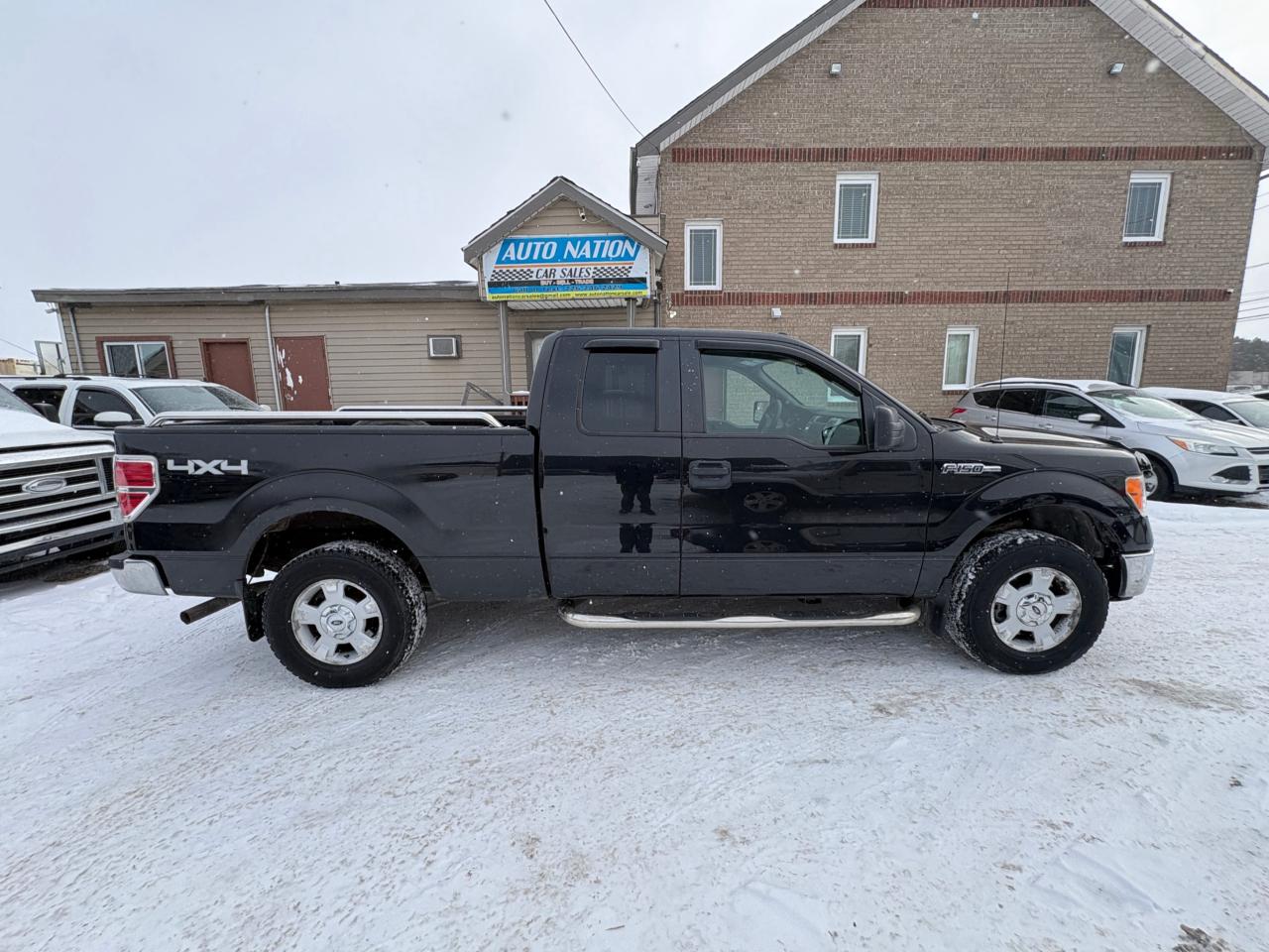 2014 Ford F-150 4WD SuperCab 163" XLT, Low KM, with Safety and 1 year $5000 per claim Warranty Photo
