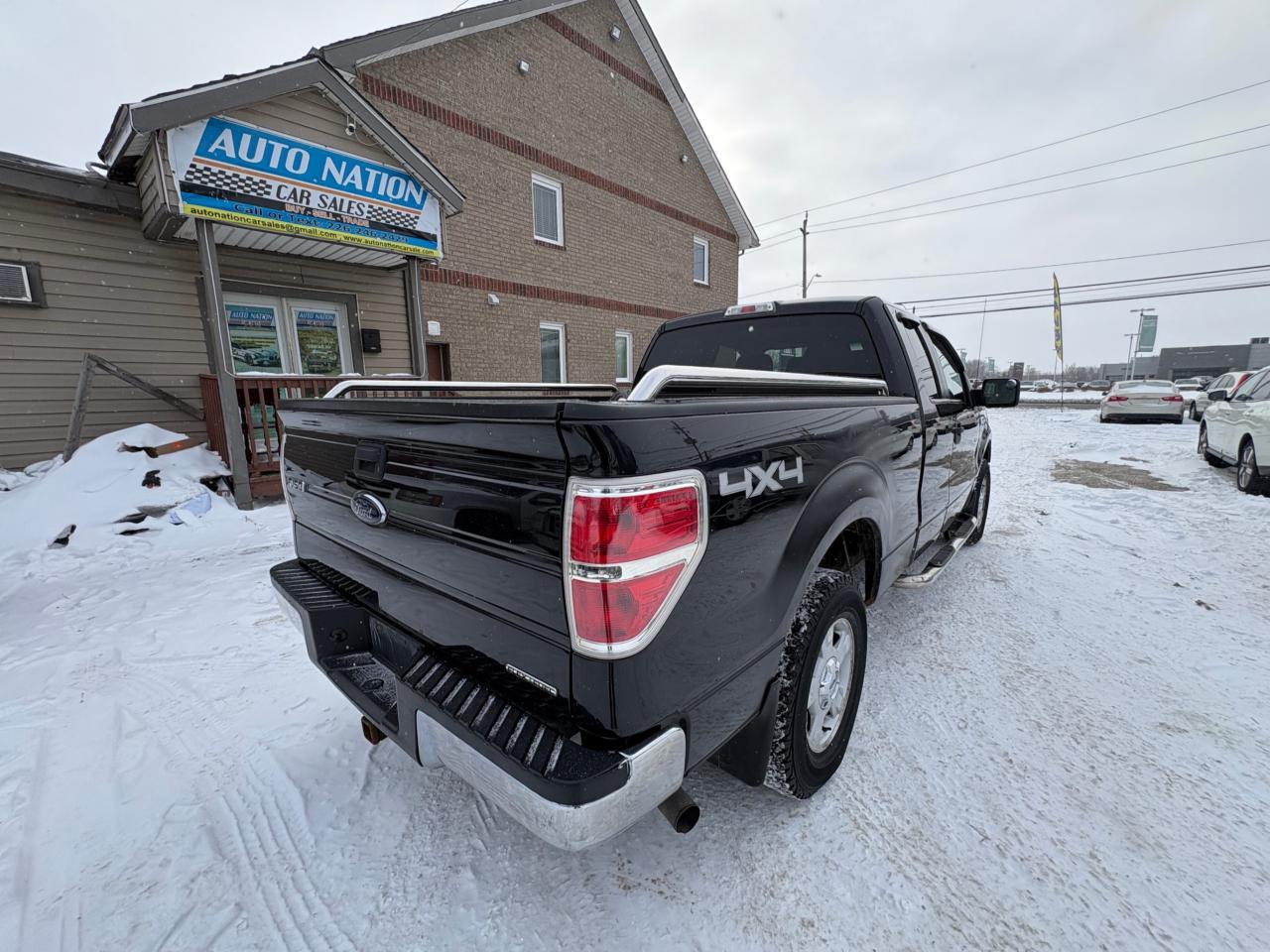 2014 Ford F-150 4WD SuperCab 163" XLT, Low KM, with Safety and 1 year $5000 per claim Warranty Photo
