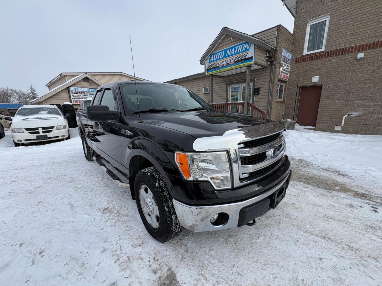 2014 Ford F-150 4WD SuperCab 163" XLT, Low KM, with Safety and 1 year $5000 per claim Warranty Photo