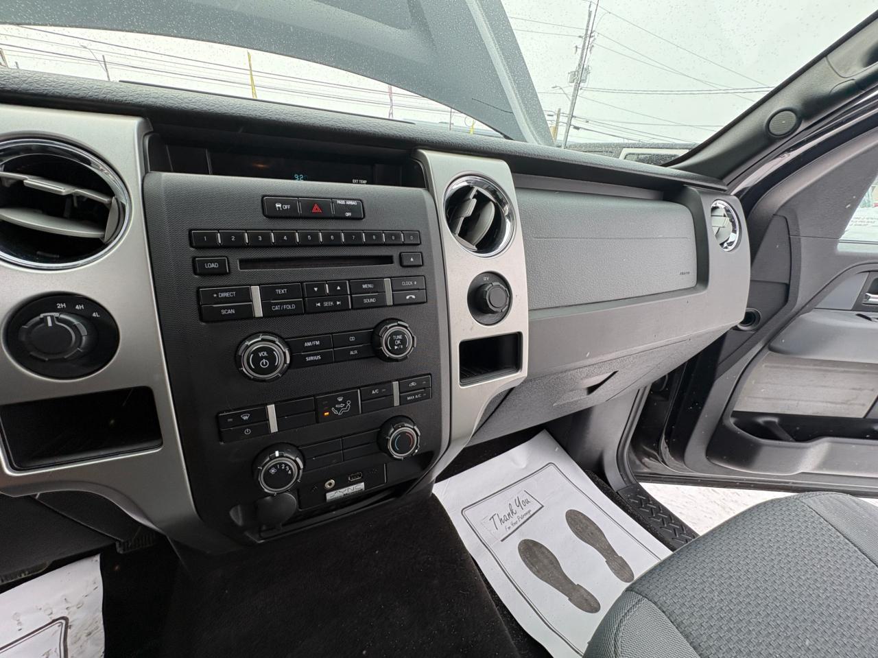 2014 Ford F-150 4WD SuperCab 163" XLT, Low KM, with Safety and 1 year $5000 per claim Warranty Photo