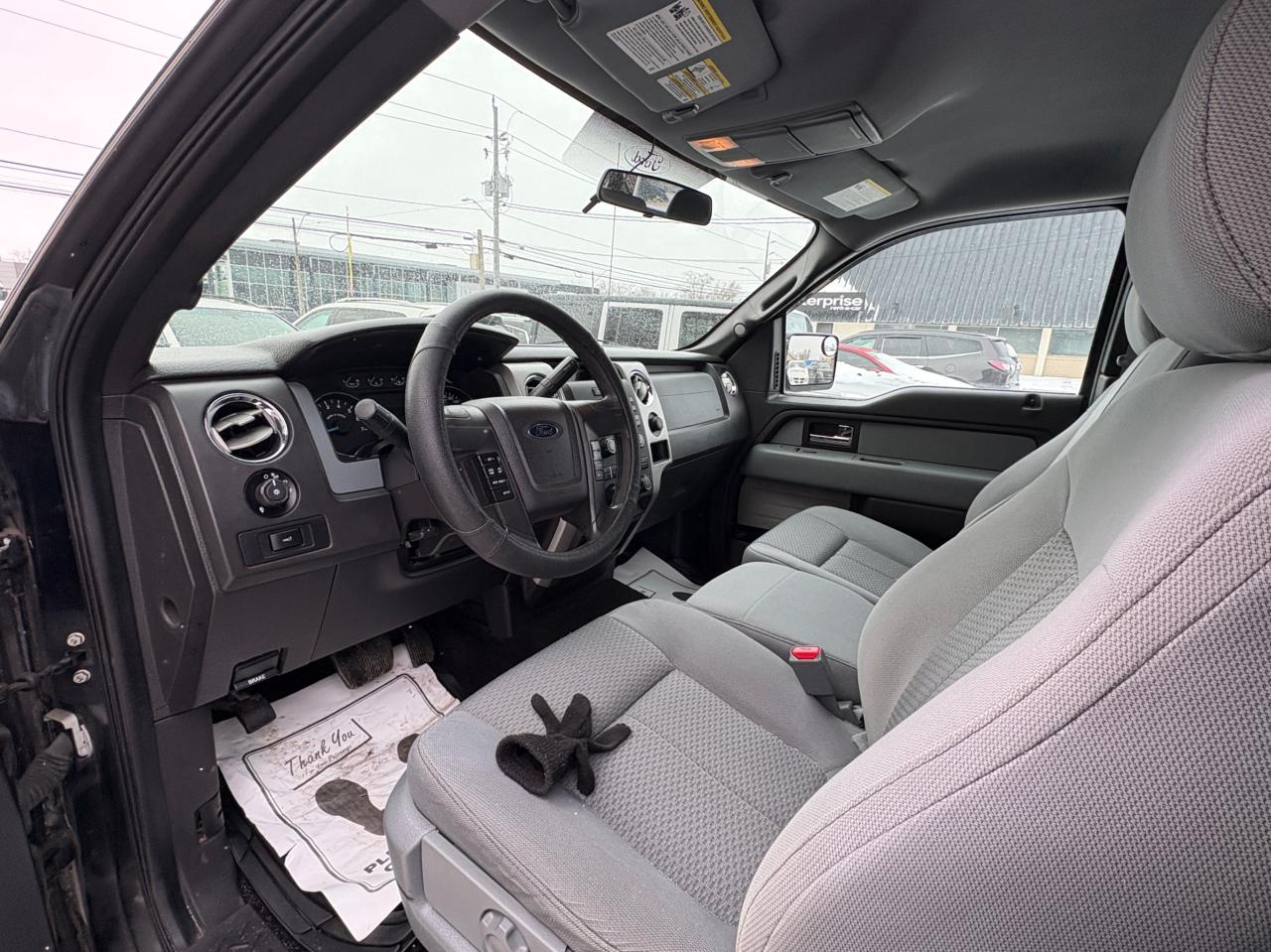 2014 Ford F-150 4WD SuperCab 163" XLT, Low KM, with Safety and 1 year $5000 per claim Warranty Photo