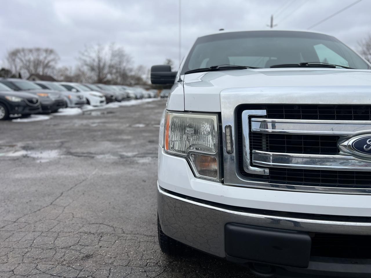 2013 Ford F-150 4WD SuperCab 145" Photo