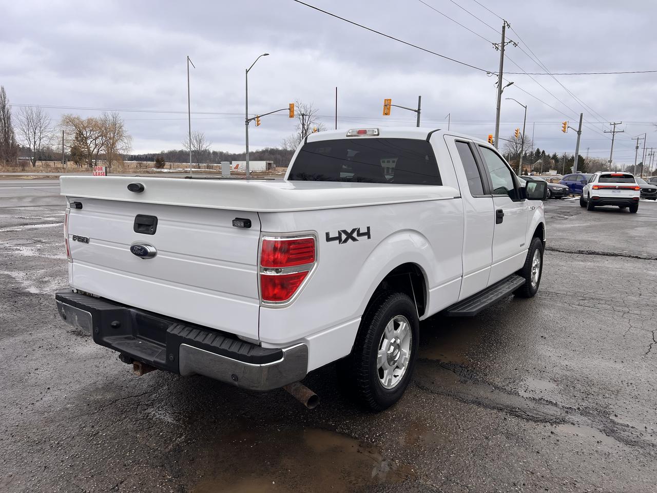 2013 Ford F-150 4WD SuperCab 145" Photo2
