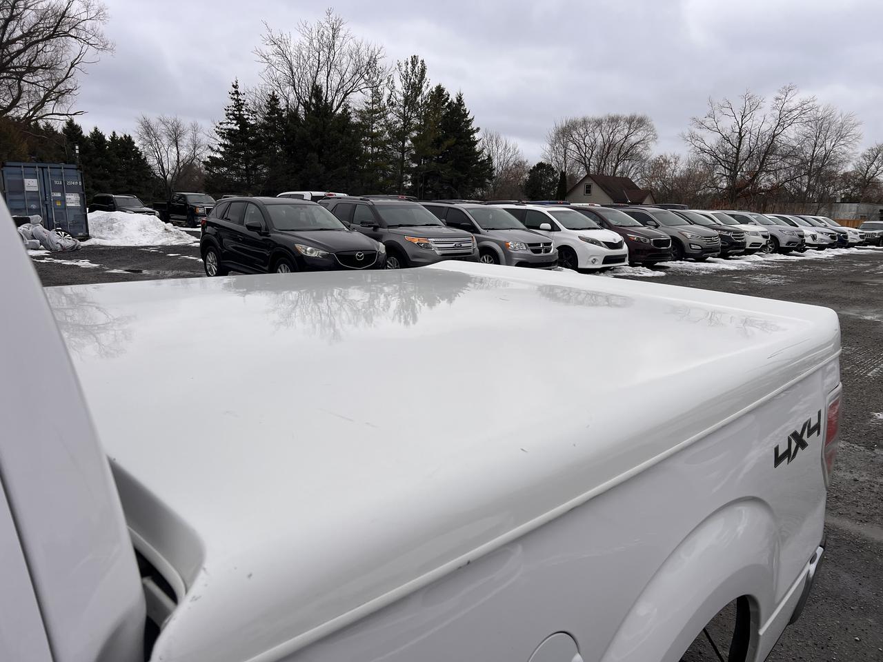 2013 Ford F-150 4WD SuperCab 145" Photo