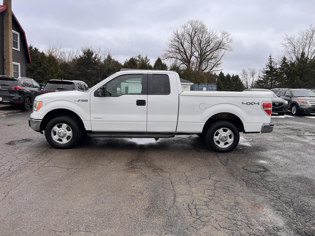 2013 Ford F-150 4WD SuperCab 145" Photo