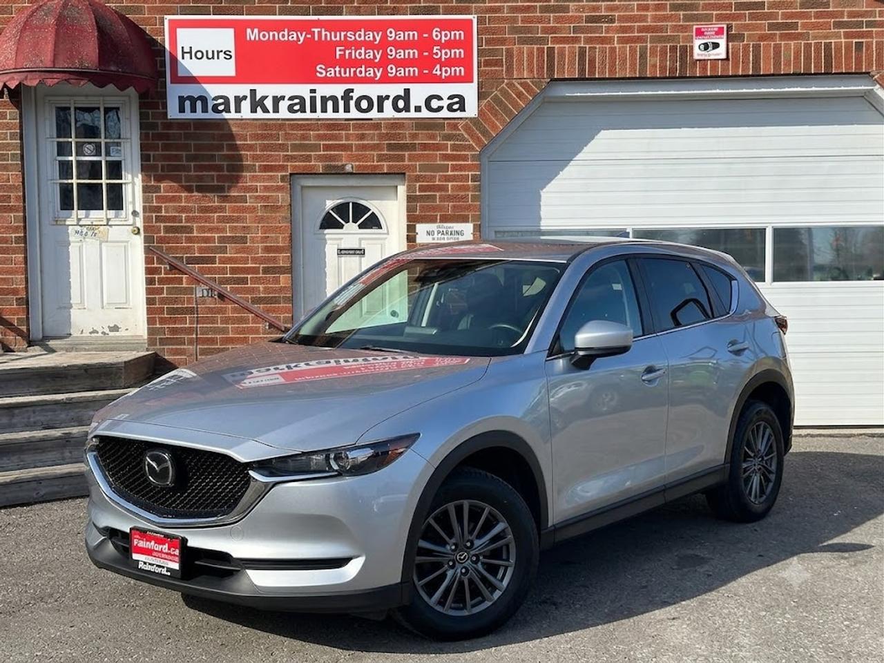 <p>WOW! Stunning LOW KM Mazda CX-5 from Perth, ON! This GS-AWD model looks great in its Silver paint and factory alloy wheels, with nice options inside and out! The exterior features keyless entry, colour-matched side mirrors with blind spot monitors, forward collision/adaptive cruise control, lane keeping assist, a power rear liftgate, tinted rear privacy glass, a sleek rear spoiler, sporty dual rear exhaust, gorgeous split spoke dark alloy wheels, and a peppy fuel-efficient 2.5L 4-Cylinder Engine and Automatic transmission powering the All-Wheel-Drive System. The interior is clean and comfortable, with heated front leather seats with drivers power adjustment and suede-style centres, spacious and comfortable rear seating, a large cargo area, power door locks, windows and mirrors, a heated leather wrapped steering wheel with Audio and Cruise controls, push button start, an easy to read and use gauge cluster, central AM/FM HD Radio with Bluetooth, Apple CarPlay, Android Auto and Backup Camera, A/Cclimate controls with front and rear window defrost settings, SPORT Driving mode, USB/AUX/12V accessory ports and more!</p><p>&nbsp;</p><p>Carfax Claims Free, LOW KM, Incredible Looks and Great Options!</p><p>&nbsp;</p><p>Call (905) 623-2906</p><p>&nbsp;</p><p>Text Ryan: (905) 429-9680 or email: ryan@markrainford.ca</p><p>&nbsp;</p><p>Text Mark: (905) 431-0966 or email: mark@markrainford.ca</p>