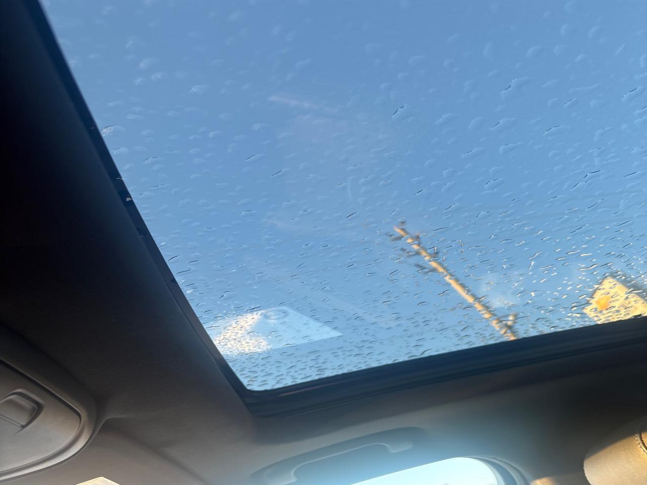 2024 Cadillac XT4 Sport AWd + Sunroof + Tech Pkg + Winters + 1 Owner Photo