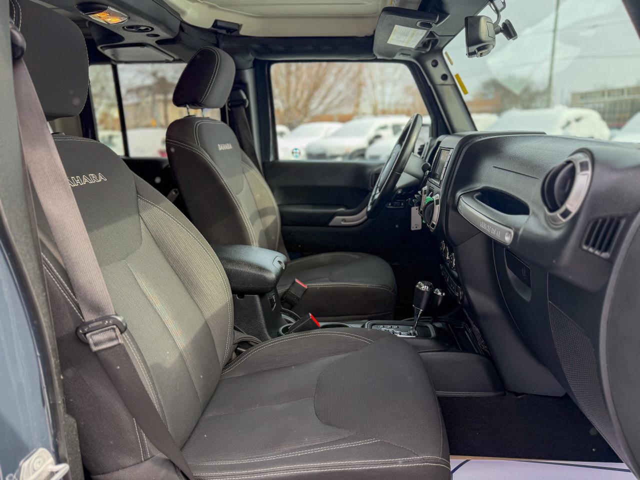 2016 Jeep WRANGLER UNLIMITED 4WD 4dr Sahara Photo