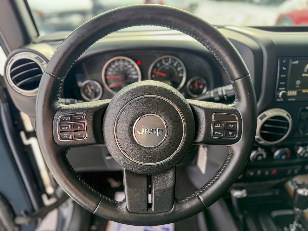 2016 Jeep WRANGLER UNLIMITED 4WD 4dr Sahara Photo