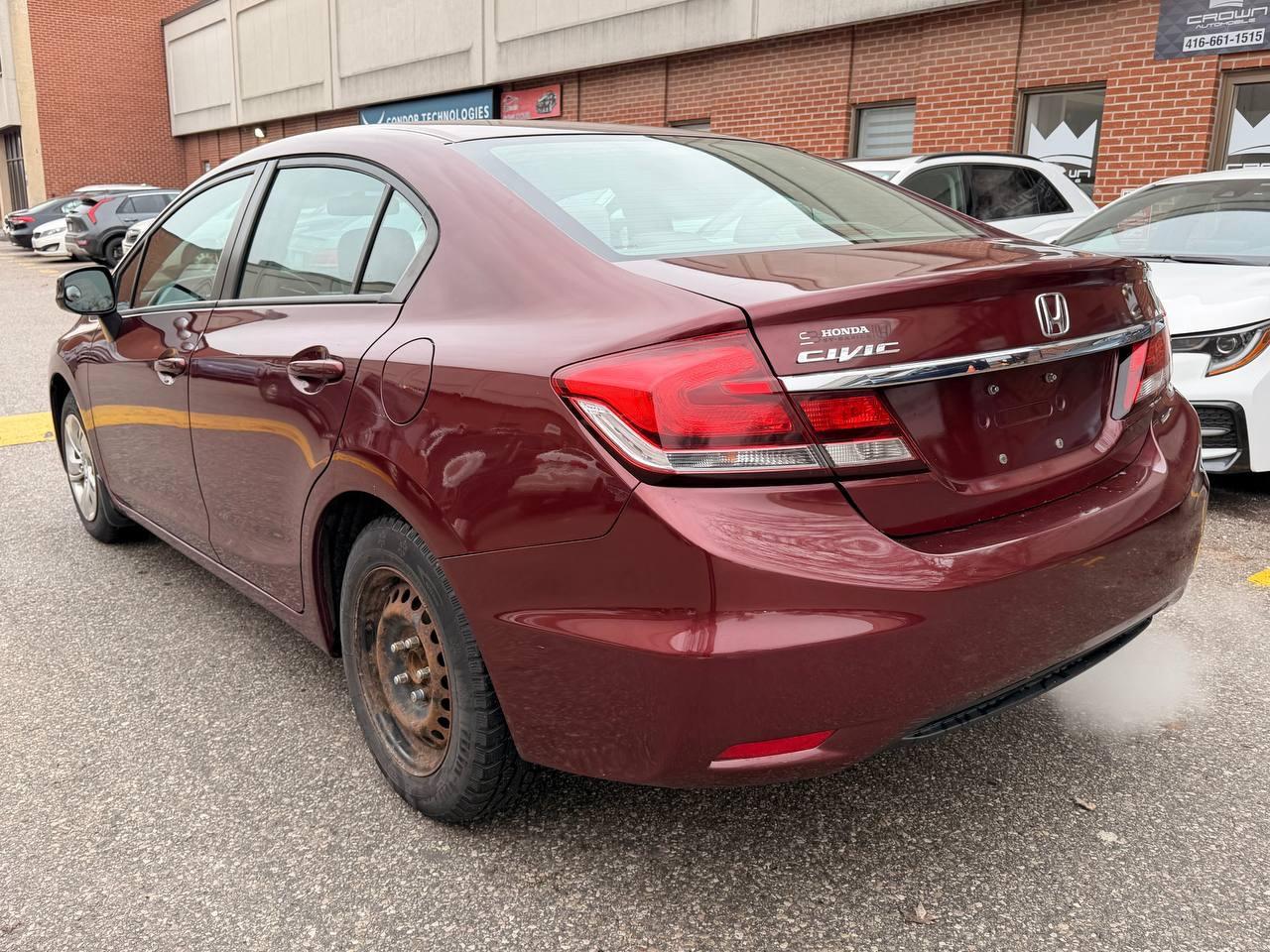 2013 Honda Civic 4dr Auto LX Photo