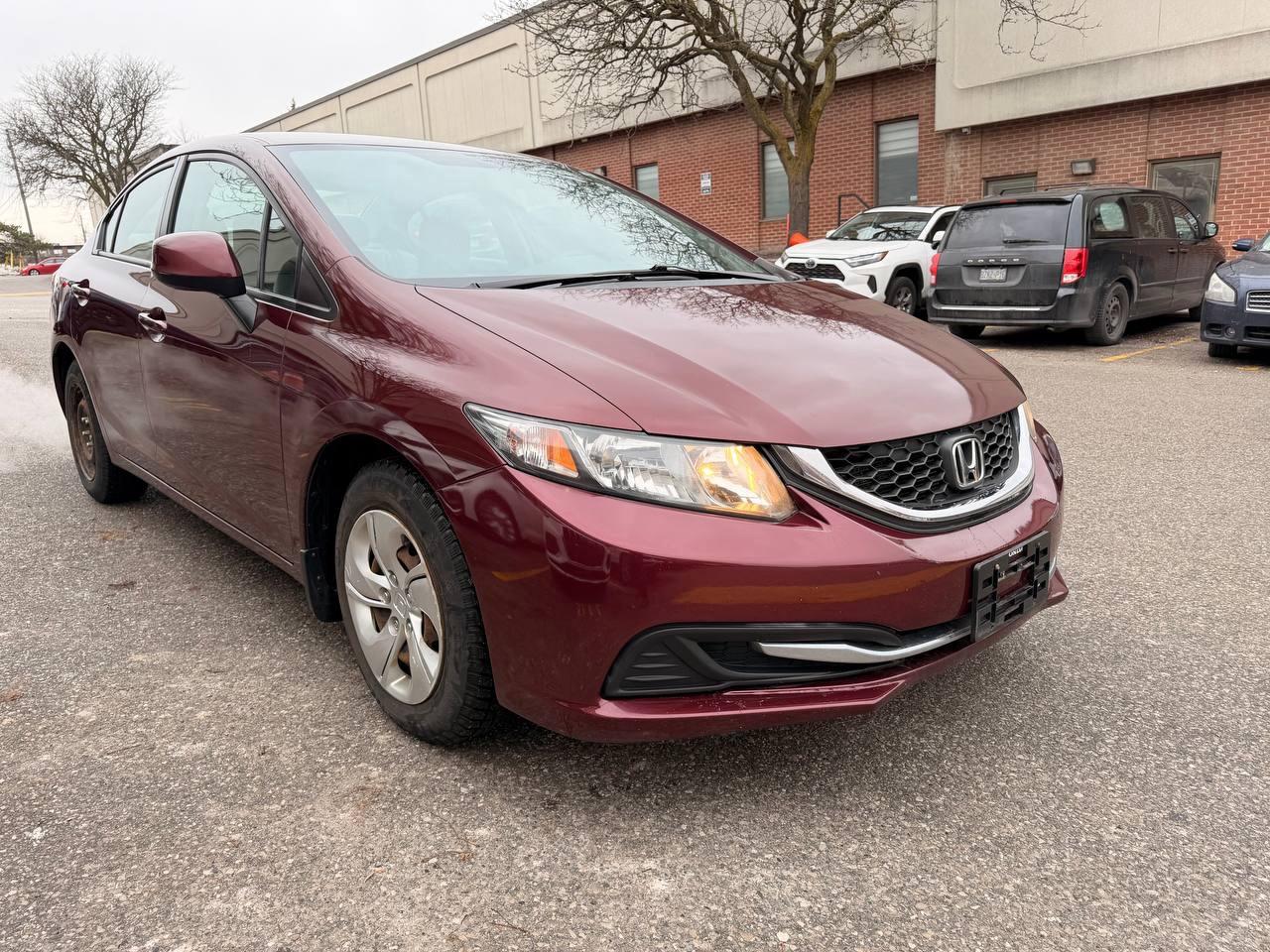 2013 Honda Civic 4dr Auto LX Photo