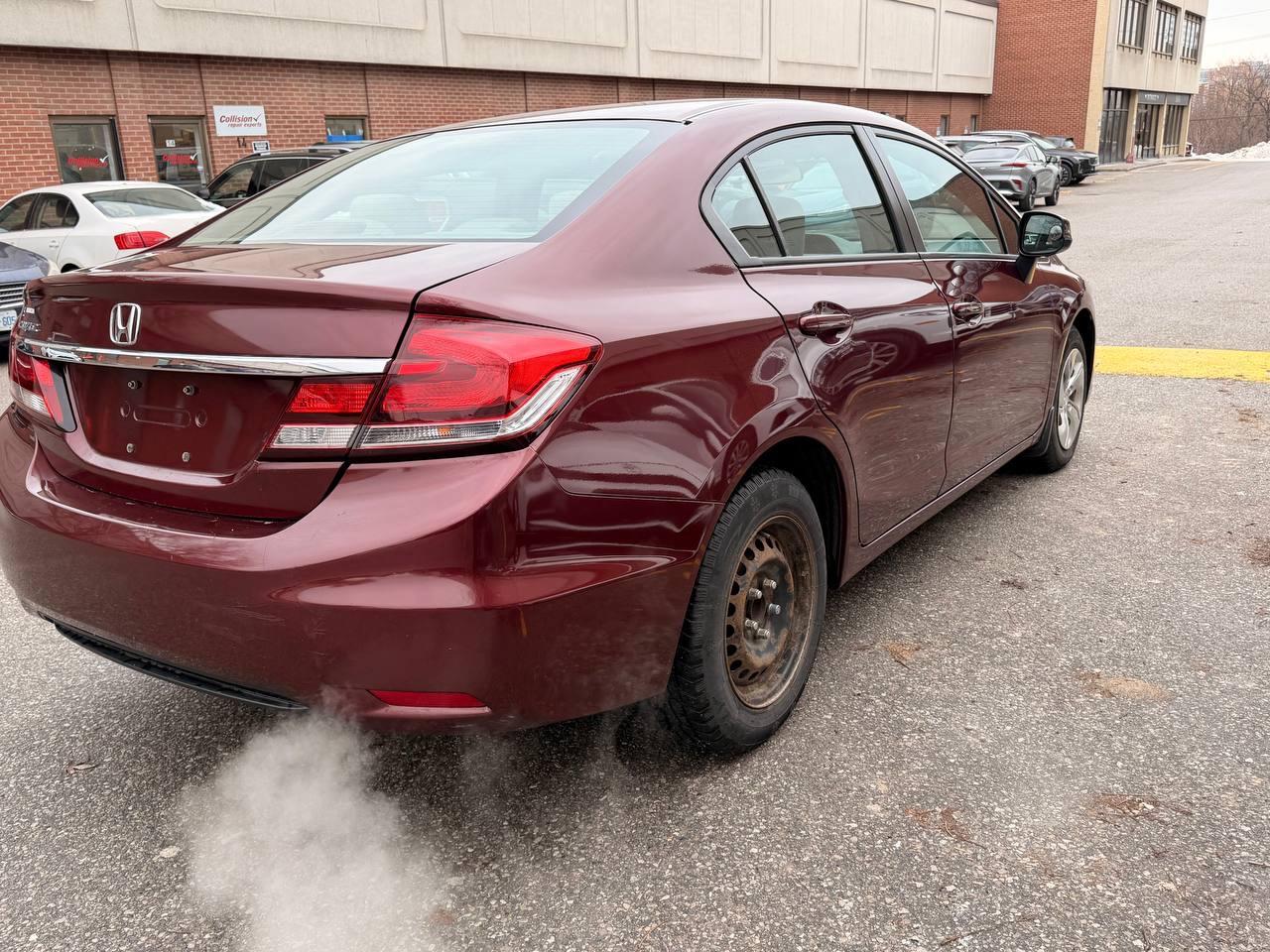 2013 Honda Civic 4dr Auto LX Photo