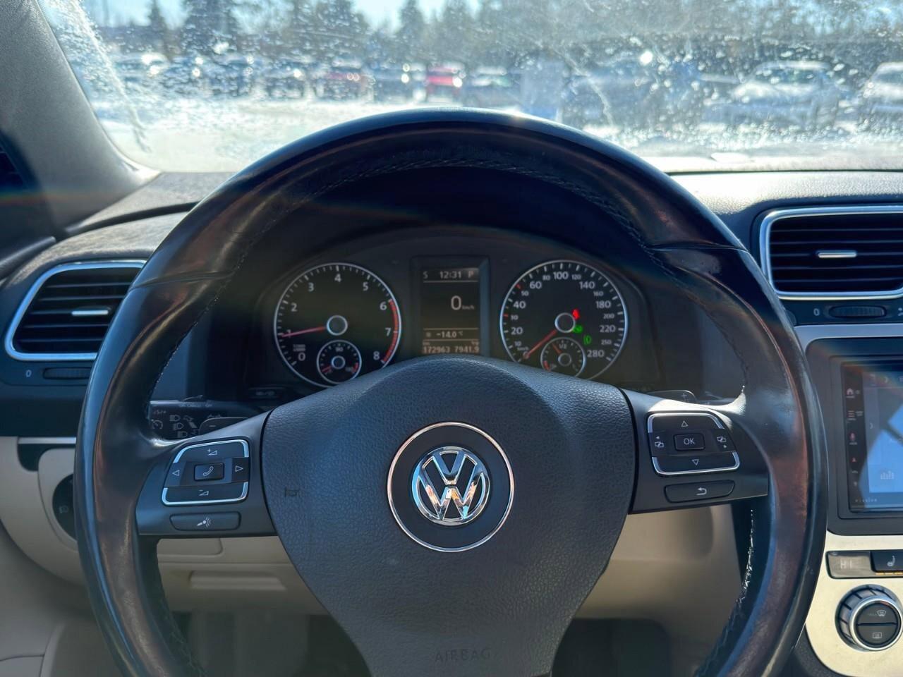 2013 Volkswagen Eos HighlineCERTIFIED AS-TRADED, SUNROOF/HARDTOP CONVE Photo