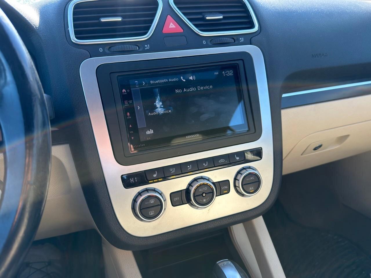 2013 Volkswagen Eos HighlineCERTIFIED AS-TRADED, SUNROOF/HARDTOP CONVE Photo