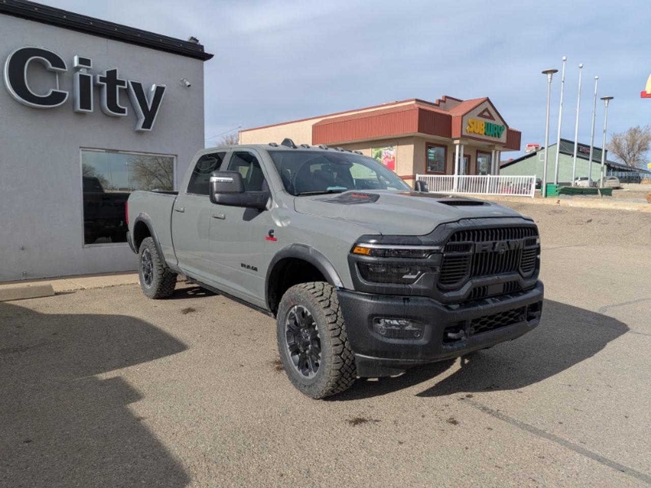 <p>The 2026 Ram 2500 Rebel is a bold and off-road-capable heavy-duty pickup truck built to deliver exceptional diesel performance rugged durability and aggressive styling. Powered by the legendary 6.7L Cummins turbo diesel inline-6 engine producing an impressive 430 horsepower this truck delivers massive towing capability outstanding torque and dependable strength for demanding workloads and outdoor adventures alike. Equipped with a capable 4x4 drivetrain the Ram 2500 Rebel is engineered to confidently tackle Alberta winters rough terrain job sites and long-distance towing with ease.</p><p>The spacious Crew Cab configuration provides generous room for passengers and gear while offering a refined interior loaded with modern technology and premium comfort features throughout. Its short box design balances excellent cargo versatility with everyday maneuverability making it equally practical for work and recreation. Combining aggressive Rebel styling Cummins diesel reliability and Ram&rsquos legendary heavy-duty engineering the 2026 Ram 2500 Rebel delivers the perfect blend of rugged capability comfort and serious truck performance.</p><p>City Chrysler holds a high standard of service &amp excellence for our customers. We are located on the northside of highway 3 of Medicine Hat. Servicing areas from Swift Current to Lethbridge Brooks &amp Taber. Our legacy is to make sure our customers feel right at home as well as taken care of in the highest priority. We are known for being down to earth super friendly and very knowledgeable. We provide excellent customer service and if you are tired of high-pressure sales then City Chrysler is for you. Check out our Google reviews because they tell our story. Then give us a call send us an email or stop by and let us get to work for you! Bankruptcies No credit Bad credit Slow credit Dont sweat it! Get preapproved today!</p>
