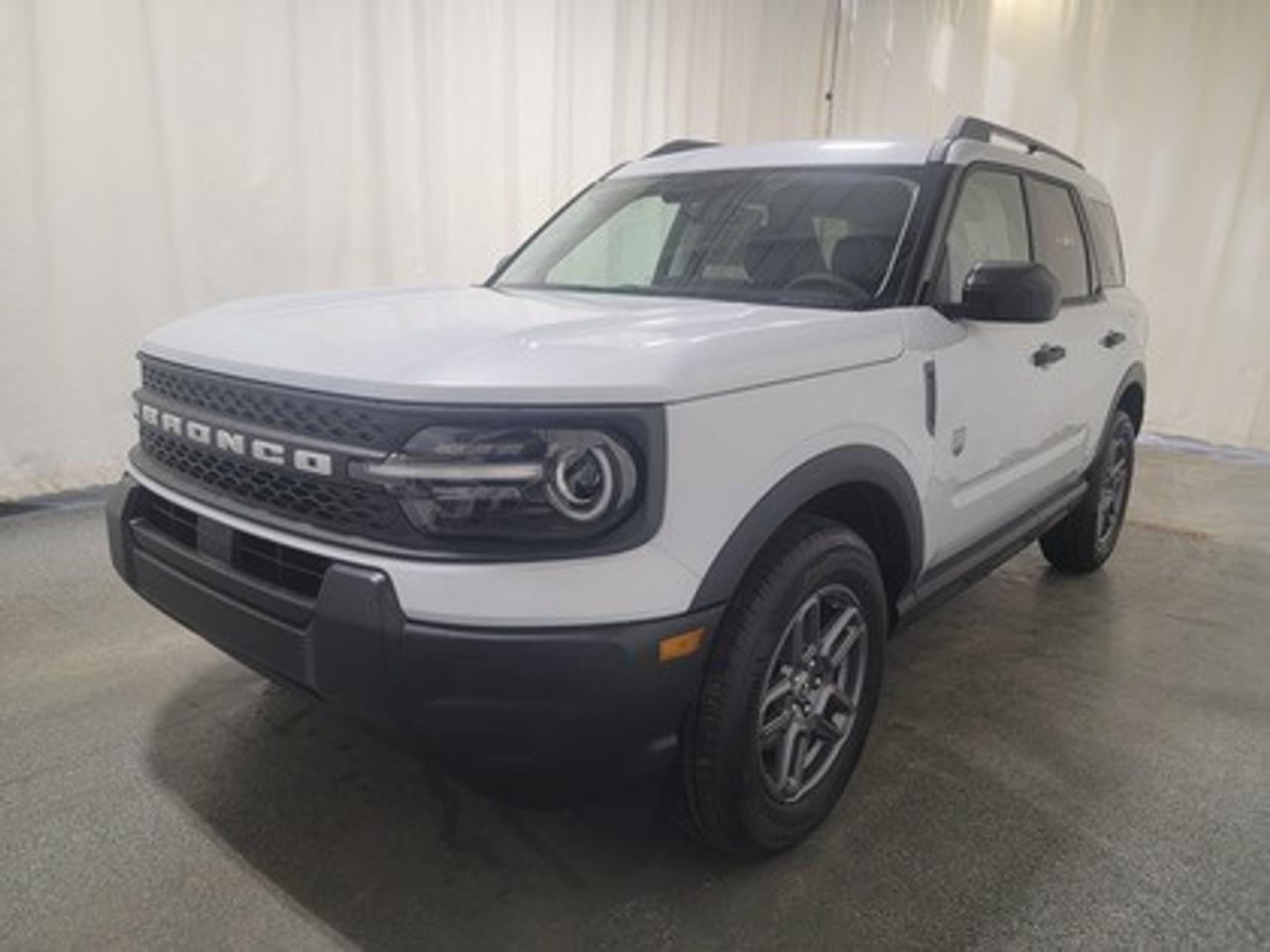 This rugged and refined 2026 Ford Bronco Sport Big Bend 200A stands out in Space White Metallic. Built to tackle adventure and city streets alike, this 5-passenger SUV is powered by a 1.5L EcoBoost® engine, delivering 181 horsepower and 190 lb-ft of torque. Coupled with an 8-speed automatic transmission, the Bronco Sport offers impressive fuel efficiency and performance to match your lifestyle.

Key Features Include:
Heated Front Seats
13.2 Center Display
8-Way Power Drivers Seat
SYNC® 4 with a 13.2 Color Touchscreen
Ford Co-Pilot360 Assist+ featuring Adaptive Cruise Control with Stop & Go
Terrain Management System with 5 G.O.A.T. Modes
LED Headlamps, Fog Lamps, and Signature Lighting
17 Carbonized Grey-Painted High Gloss Aluminum Wheels
Wireless Apple CarPlay® and Android Auto Compatibility
Privacy Glass
Intelligent Access with Push-Button Start
Power Moonroof
Convenience Package

This vehicle comes with the All-Weather Packageready to take on any season!
Snow, rain, mud, or sunshinethis vehicle is built for it all! The All-Weather Package adds extra protection where it matters most, with premium mud flaps to shield your paint from road debris, all-weather floor mats to protect your interior from lifes messes, and Xpel paint protection to help guard against those infuriating rock chips. Drive with confidence, knowing your investment is protected from Regina's elements.
 
Bennett Dunlop Ford, proudly serving Regina for over 40 years, is conveniently located at 770 Broad Street. With over 3,500 Google reviews, our reputation reflects our commitment to providing a fast, easy, and enjoyable vehicle-buying experience. We eliminate the hassle with no admin or documentation fees, transparent upfront pricing that lets you shop with total confidence. But were more than just a dealershipwere driven to make a difference by supporting local community initiatives and events that matter to you. Visit Bennett Dunlop Ford today and experience why were Reginas trusted choice for quality vehicles, exceptional service, and a genuine commitment to driving change in our community!