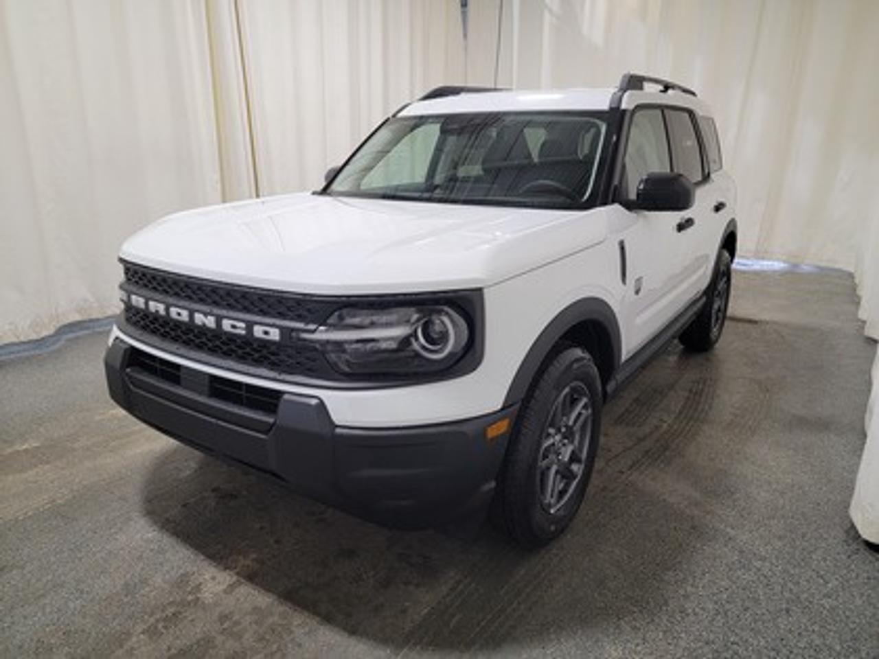 This rugged and refined 2026 Ford Bronco Sport Big Bend 200A stands out in Oxford White. Built to tackle adventure and city streets alike, this 5-passenger SUV is powered by a 1.5L EcoBoost® engine, delivering 181 horsepower and 190 lb-ft of torque. Coupled with an 8-speed automatic transmission, the Bronco Sport offers impressive fuel efficiency and performance to match your lifestyle.

This vehicle comes with the All-Weather Packageready to take on any season! 

Snow, rain, mud, or sunshinethis vehicle is built for it all! The All-Weather Package adds extra protection where it matters most, with premium mud flaps to shield your paint from road debris, all-weather floor mats to protect your interior from lifes messes, and Xpel paint protection to help guard against those infuriating rock chips. Drive with confidence, knowing your investment is protected from Regina's elements. 

Key Features Include:
Heated Front Seats
13.2 Center Display
8-Way Power Drivers Seat
SYNC® 4 with a 13.2 Color Touchscreen
Ford Co-Pilot360 Assist+ featuring Adaptive Cruise Control with Stop & Go
Terrain Management System with 5 G.O.A.T. Modes
LED Headlamps, Fog Lamps, and Signature Lighting
17 Carbonized Grey-Painted High Gloss Aluminum Wheels
Wireless Apple CarPlay® and Android Auto Compatibility
Privacy Glass
Intelligent Access with Push-Button Start

Saskatchewans weather is no match for the Bronco Sport Big Bend, thanks to its thoughtful design and advanced technology. The vehicle offers enhanced safety features such as BLIS® (Blind Spot Information System) with Cross-Traffic Alert, Hill Start Assist, and a Rearview Camera with Backup Assist Grid Lines. Inside, comfort is prioritized with electronic automatic temperature control, a premium sound system, heated front seats, and additional storage solutions.

Bennett Dunlop Ford, proudly serving Regina for over 40 years, is conveniently located at 770 Broad Street. With over 3,500 Google reviews, our reputation reflects our commitment to providing a fast, easy, and enjoyable vehicle-buying experience. We eliminate the hassle with no admin or documentation fees, transparent upfront pricing that lets you shop with total confidence. But were more than just a dealershipwere driven to make a difference by supporting local community initiatives and events that matter to you. Visit Bennett Dunlop Ford today and experience why were Reginas trusted choice for quality vehicles, exceptional service, and a genuine commitment to driving change in our community!