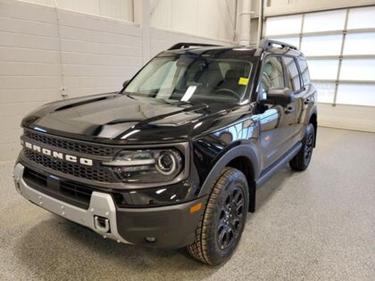 This all-new 2026 Ford Bronco Sport Badlands 400A stands out in Shadow Black, showcasing a rugged yet refined look. This 5-passenger SUV is equipped with the 2.0L EcoBoost® engine, producing 250 horsepower and 277 lb-ft of torque. Paired with an 8-speed automatic transmission, this vehicle ensures seamless power delivery both on and off the road, it is engineered to conquer tough terrains with ease.

Key Features:
Advanced 4x4 with Terrain Management System and 7 G.O.A.T. Modes
Leather-Trimmed Sport Heated Front Seats
Heated Premium-Wrapped Steering Wheel
Rubberized Floor and Cargo Area for Easy Cleaning
HOSS 2.0 Off-Road Suspension
17 Matte Black-Painted Aluminum Wheels with All-Terrain Tires
Class II Trailer Tow Package with Trailer Sway Control
Ford Co-Pilot360 Assist 2.0, including:
360-Degree Camera with Trail View
Reverse Brake Assist
Front Parking Sensors
12.3 Digital Instrument Panel Cluster
SYNC® 4 with a 13.2 Center Display, featuring Wireless Apple CarPlay® and Android Auto
Trail Control with One-Pedal Driving

Designed for adventure, the Badlands 400A delivers confidence in harsh weather and challenging landscapes. Features like D-ring recovery hooks, and a 110V/400W AC power outlet ensure you're equipped for any situation. Its tech-forward interior includes dual-zone automatic climate control and universal garage door opener, under seat storage compartment and even a bottle opener for ultimate convenience.

At Moose Jaw Ford, we're driving change all across Saskatchewan! We are Moose Jaw's prime destination for everything automotive. We pride ourselves by consistently providing the highest quality customer experience  every single time. Because of this commitment, and the love of what we do, Moose Jaw Ford is the recipient of multiple President's Club Awards and is recognized as one of Canada's Best Managed Companies. We are dedicated to building long lasting relationships. You can trust that our trained service technicians will take excellent care of you and your vehicle when you visit our service department. Come visit us today at 1010 North Service Road.