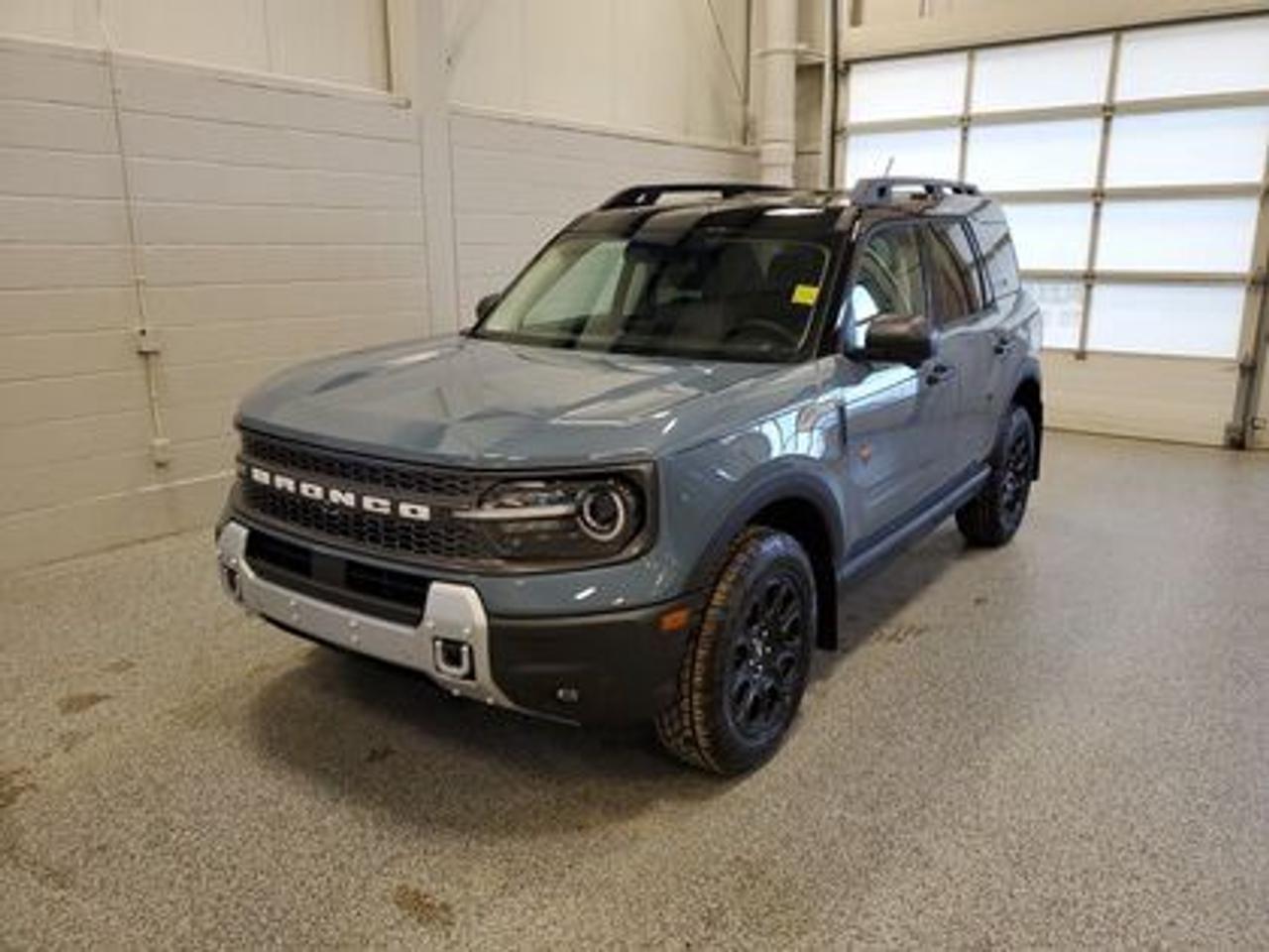 This all-new 2026 Ford Bronco Sport Badlands 400A stands out in Azure Grey Metallic Tri-Coat, showcasing a rugged yet refined look. This 5-passenger SUV is equipped with the 2.0L EcoBoost® engine, producing 250 horsepower and 277 lb-ft of torque. Paired with an 8-speed automatic transmission, this vehicle ensures seamless power delivery both on and off the road, it is engineered to conquer tough terrains with ease.

Key Features:
Advanced 4x4 with Terrain Management System and 7 G.O.A.T. Modes
Leather-Trimmed Sport Heated Front Seats
Heated Premium-Wrapped Steering Wheel
Rubberized Floor and Cargo Area for Easy Cleaning
HOSS 2.0 Off-Road Suspension
17 Matte Black-Painted Aluminum Wheels with All-Terrain Tires
Class II Trailer Tow Package with Trailer Sway Control
Ford Co-Pilot360 Assist 2.0, including:
360-Degree Camera with Trail View
Reverse Brake Assist
Front Parking Sensors
12.3 Digital Instrument Panel Cluster
SYNC® 4 with a 13.2 Center Display, featuring Wireless Apple CarPlay® and Android Auto
Trail Control with One-Pedal Driving
Power Moonroof
Badlands Tech Package

Designed for adventure, the Badlands 400A delivers confidence in harsh weather and challenging landscapes. Features like D-ring recovery hooks, and a 110V/400W AC power outlet ensure you're equipped for any situation. Its tech-forward interior includes dual-zone automatic climate control and universal garage door opener, under seat storage compartment and even a bottle opener for ultimate convenience.

At Moose Jaw Ford, we're driving change all across Saskatchewan! We are Moose Jaw's prime destination for everything automotive. We pride ourselves by consistently providing the highest quality customer experience  every single time. Because of this commitment, and the love of what we do, Moose Jaw Ford is the recipient of multiple President's Club Awards and is recognized as one of Canada's Best Managed Companies. We are dedicated to building long lasting relationships. You can trust that our trained service technicians will take excellent care of you and your vehicle when you visit our service department. Come visit us today at 1010 North Service Road.