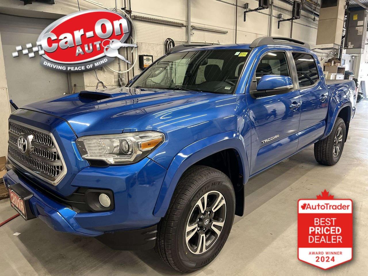 TRD SPORT 4X4 DOUBLE CAB 6-SPEED MANUAL W/ UPGRADE PACKAGE!! Sunroof, heated seats, navigation, 17-inch alloys, blind spot monitor, rear cross-traffic alert, backup camera, wireless charger, hard folding tonneau cover, 400w AC outlet, tow package, 5-foot box w/ bedliner, dual-zone climate control, keyless entry, roof rails, power locks, power mirrors, power windows, automatic headlights, cruise control, Bluetooth and Sirius XM!!*This car was used as a previous daily rental*