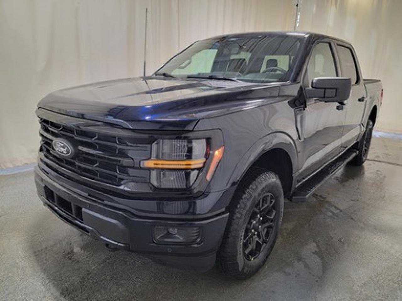 The all-new 2026 Ford F-150 XLT 302A is a statement of style in Antimatter Blue Metallic. Powered by the 3.5L V6 engine, it delivers 400 horsepower and 500 lb-ft of torque, paired with a 10-speed automatic transmission. This truck achieves an impressive, combined fuel economy of 12.3L/100 km (23 miles per gallon).

Key Features:
12 LCD Captivity Touchscreen
Electronic Power-Assist Steering
Dual-Zone Electronic Auto Temp Control
Cruise Control
Power Windows
AdvanceTrac® With Roll Stability Control
Perimeter Alarm
Ford Co-Pilot360
Lane Keeping System
Rear View Camera
Rear Parking Sensors
Reverse Park Assist
Class IV Trailer Hitch
Power Drivers Seat
Remote Start
SYNC®4
Apple Car Play
18 All Terrain Tires
Bluetooth Connectivity
XLT Black Appearance Package
Engine Block Heater

This vehicle comes with the All-Weather Packageready to take on any season!
Snow, rain, mud, or sunshinethis vehicle is built for it all! The All-Weather Package adds extra protection where it matters most, with premium mud flaps to shield your paint from road debris, all-weather floor mats to protect your interior from lifes messes, and Xpel paint protection to help guard against those infuriating rock chips. Drive with confidence, knowing your investment is protected from Regina's elements.

Bennett Dunlop Ford, proudly serving Regina for over 40 years, is conveniently located at 770 Broad Street. With over 3,500 Google reviews, our reputation reflects our commitment to providing a fast, easy, and enjoyable vehicle-buying experience. We eliminate the hassle with no admin or documentation fees, transparent upfront pricing that lets you shop with total confidence. But were more than just a dealershipwere driven to make a difference by supporting local community initiatives and events that matter to you. Visit Bennett Dunlop Ford today and experience why were Reginas trusted choice for quality vehicles, exceptional service, and a genuine commitment to driving change in our community!