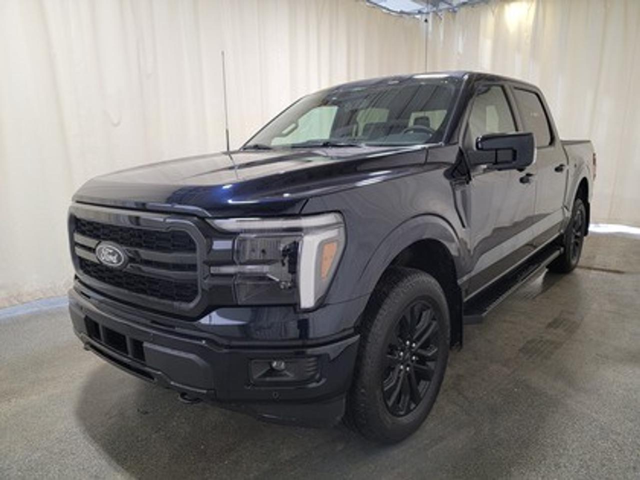 This all-new 2026 Ford F-150 Lariat is showcased in the elegant Antimatter Blue Metallic. Equipped with the powerful 3.5L V6 engine, it produces 400 horsepower and 500 lb-ft of torque. Paired with a 10-speed automatic transmission, this truck is built to deliver excellent fuel efficiency giving it a combined highway/city rating of 12.3L 100/km (23 miles per gallon).

Key Features:
Ford Co-Pilot360 Assist 2.0
Adaptive Cruise Control
360-Degreee Camera
Lane Centering Assist
Evasive Steering Assist
Front Parking Sensors
14 Speaker B&O Sound System
Connected Navigation
Remote Start System
Universal Garage Door Opener
Heated Steering Wheel
Memory Driver Seat
Heated And Ventilated Front Seats
Lariat Black Appearance Package
Engine Block Heater

This vehicle comes with the All-Weather Packageready to take on any season!
Snow, rain, mud, or sunshinethis vehicle is built for it all! The All-Weather Package adds extra protection where it matters most, with premium mud flaps to shield your paint from road debris, all-weather floor mats to protect your interior from lifes messes, and Xpel paint protection to help guard against those infuriating rock chips. Drive with confidence, knowing your investment is protected from Regina's elements.
 
Bennett Dunlop Ford, proudly serving Regina for over 40 years, is conveniently located at 770 Broad Street. With over 3,500 Google reviews, our reputation reflects our commitment to providing a fast, easy, and enjoyable vehicle-buying experience. We eliminate the hassle with no admin or documentation fees, transparent upfront pricing that lets you shop with total confidence. But were more than just a dealershipwere driven to make a difference by supporting local community initiatives and events that matter to you. Visit Bennett Dunlop Ford today and experience why were Reginas trusted choice for quality vehicles, exceptional service, and a genuine commitment to driving change in our community!