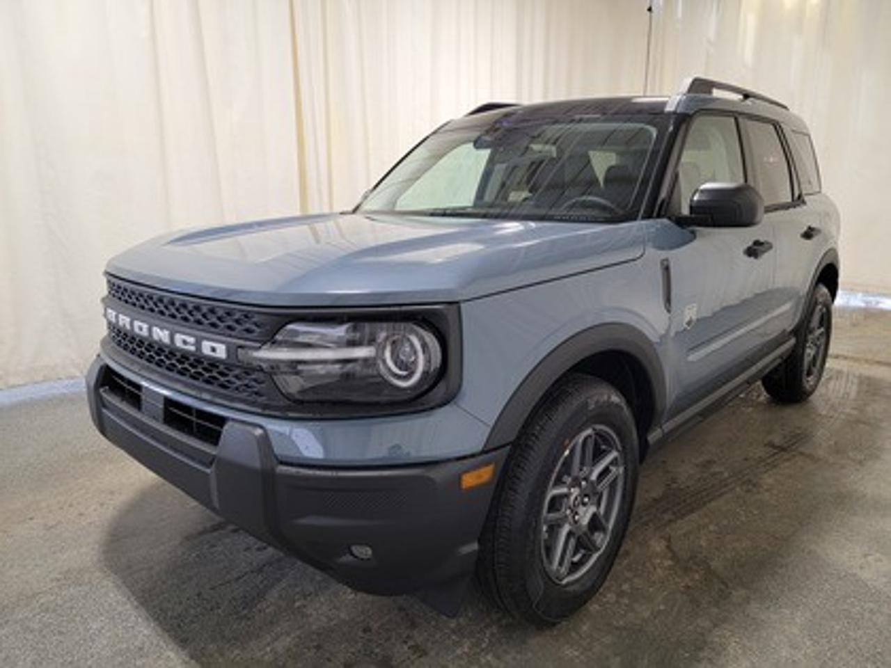 This rugged and refined 2026 Ford Bronco Sport Big Bend 200A stands out in Azure Grey Metallic. Built to tackle adventure and city streets alike, this 5-passenger SUV is powered by a 1.5L EcoBoost® engine, delivering 181 horsepower and 190 lb-ft of torque. Coupled with an 8-speed automatic transmission, the Bronco Sport offers impressive fuel efficiency and performance to match your lifestyle.

Key Features Include:
Heated Front Seats
13.2 Center Display
8-Way Power Drivers Seat
SYNC® 4 with a 13.2 Color Touchscreen
Ford Co-Pilot360 Assist+ featuring Adaptive Cruise Control with Stop & Go
Terrain Management System with 5 G.O.A.T. Modes
LED Headlamps, Fog Lamps, and Signature Lighting
17 Carbonized Grey-Painted High Gloss Aluminum Wheels
Wireless Apple CarPlay® and Android Auto Compatibility
Privacy Glass
Intelligent Access with Push-Button Start
Power Moonroof
Convenience Package

This vehicle comes with the All-Weather Packageready to take on any season!
Snow, rain, mud, or sunshinethis vehicle is built for it all! The All-Weather Package adds extra protection where it matters most, with premium mud flaps to shield your paint from road debris, all-weather floor mats to protect your interior from lifes messes, and Xpel paint protection to help guard against those infuriating rock chips. Drive with confidence, knowing your investment is protected from Regina's elements.
 
Bennett Dunlop Ford, proudly serving Regina for over 40 years, is conveniently located at 770 Broad Street. With over 3,500 Google reviews, our reputation reflects our commitment to providing a fast, easy, and enjoyable vehicle-buying experience. We eliminate the hassle with no admin or documentation fees, transparent upfront pricing that lets you shop with total confidence. But were more than just a dealershipwere driven to make a difference by supporting local community initiatives and events that matter to you. Visit Bennett Dunlop Ford today and experience why were Reginas trusted choice for quality vehicles, exceptional service, and a genuine commitment to driving change in our community!