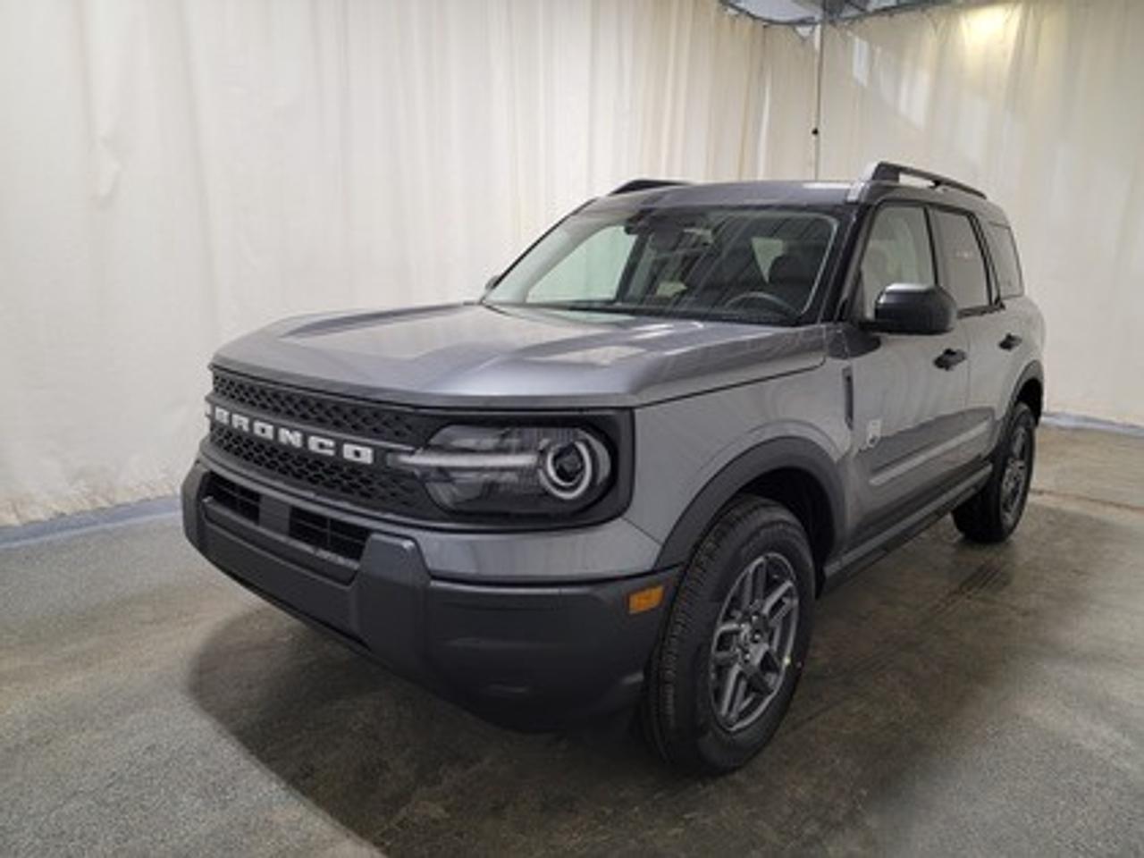 This rugged and refined 2026 Ford Bronco Sport Big Bend 200A stands out in Carbonized Grey. Built to tackle adventure and city streets alike, this 5-passenger SUV is powered by a 1.5L EcoBoost® engine, delivering 181 horsepower and 190 lb-ft of torque. Coupled with an 8-speed automatic transmission, the Bronco Sport offers impressive fuel efficiency and performance to match your lifestyle.

Key Features Include:
Heated Front Seats
13.2 Center Display
8-Way Power Drivers Seat
SYNC® 4 with a 13.2 Color Touchscreen
Ford Co-Pilot360 Assist+ featuring Adaptive Cruise Control with Stop & Go
Terrain Management System with 5 G.O.A.T. Modes
LED Headlamps, Fog Lamps, and Signature Lighting
17 Carbonized Grey-Painted High Gloss Aluminum Wheels
Wireless Apple CarPlay® and Android Auto Compatibility
Privacy Glass
Intelligent Access with Push-Button Start

This vehicle comes with the All-Weather Packageready to take on any season!
Snow, rain, mud, or sunshinethis vehicle is built for it all! The All-Weather Package adds extra protection where it matters most, with premium mud flaps to shield your paint from road debris, all-weather floor mats to protect your interior from lifes messes, and Xpel paint protection to help guard against those infuriating rock chips. Drive with confidence, knowing your investment is protected from Regina's elements.

Bennett Dunlop Ford, proudly serving Regina for over 40 years, is conveniently located at 770 Broad Street. With over 3,500 Google reviews, our reputation reflects our commitment to providing a fast, easy, and enjoyable vehicle-buying experience. We eliminate the hassle with no admin or documentation fees, transparent upfront pricing that lets you shop with total confidence. But were more than just a dealershipwere driven to make a difference by supporting local community initiatives and events that matter to you. Visit Bennett Dunlop Ford today and experience why were Reginas trusted choice for quality vehicles, exceptional service, and a genuine commitment to driving change in our community!