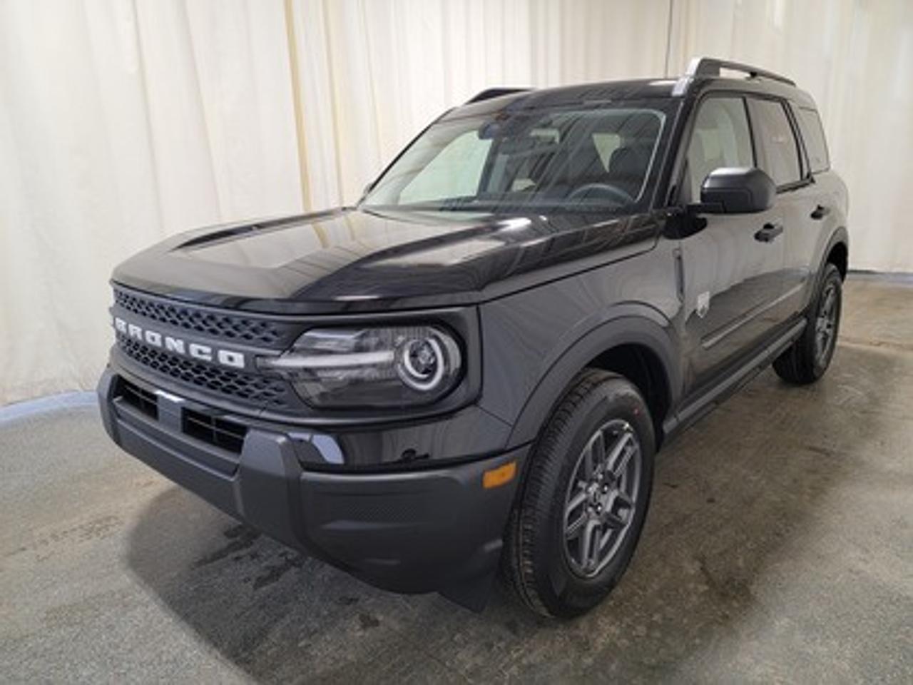This rugged and refined 2026 Ford Bronco Sport Big Bend 200A stands out in Shadow Black. Built to tackle adventure and city streets alike, this 5-passenger SUV is powered by a 1.5L EcoBoost® engine, delivering 181 horsepower and 190 lb-ft of torque. Coupled with an 8-speed automatic transmission, the Bronco Sport offers impressive fuel efficiency and performance to match your lifestyle.

Key Features Include:
Heated Front Seats
13.2 Center Display
8-Way Power Drivers Seat
SYNC® 4 with a 13.2 Color Touchscreen
Ford Co-Pilot360 Assist+ featuring Adaptive Cruise Control with Stop & Go
Terrain Management System with 5 G.O.A.T. Modes
LED Headlamps, Fog Lamps, and Signature Lighting
17 Carbonized Grey-Painted High Gloss Aluminum Wheels
Wireless Apple CarPlay® and Android Auto Compatibility
Privacy Glass
Intelligent Access with Push-Button Start

This vehicle comes with the All-Weather Packageready to take on any season!
Snow, rain, mud, or sunshinethis vehicle is built for it all! The All-Weather Package adds extra protection where it matters most, with premium mud flaps to shield your paint from road debris, all-weather floor mats to protect your interior from lifes messes, and Xpel paint protection to help guard against those infuriating rock chips. Drive with confidence, knowing your investment is protected from Regina's elements.
 
Bennett Dunlop Ford, proudly serving Regina for over 40 years, is conveniently located at 770 Broad Street. With over 3,500 Google reviews, our reputation reflects our commitment to providing a fast, easy, and enjoyable vehicle-buying experience. We eliminate the hassle with no admin or documentation fees, transparent upfront pricing that lets you shop with total confidence. But were more than just a dealershipwere driven to make a difference by supporting local community initiatives and events that matter to you. Visit Bennett Dunlop Ford today and experience why were Reginas trusted choice for quality vehicles, exceptional service, and a genuine commitment to driving change in our community!