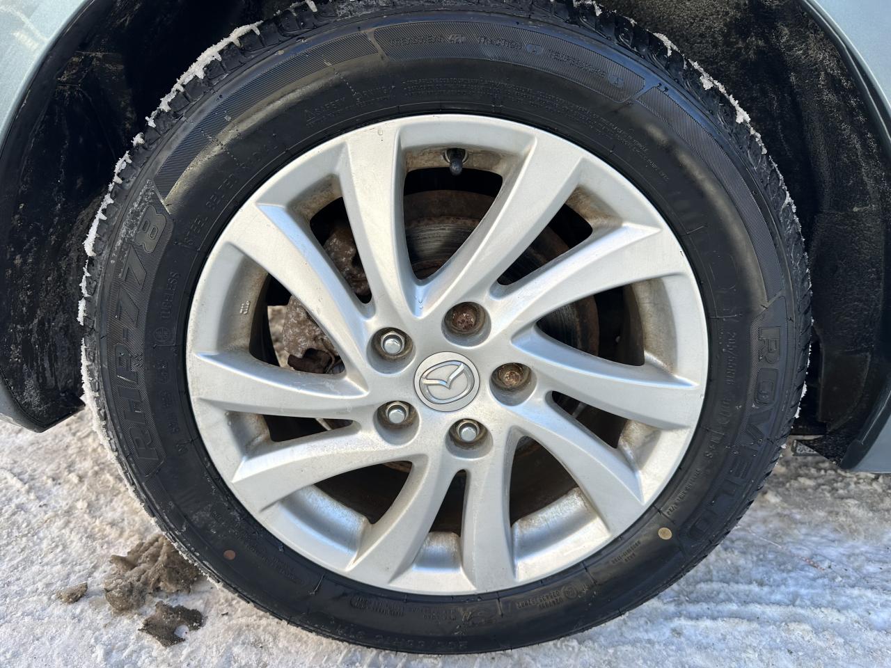 2012 Mazda MAZDA3 4dr HB Sport Auto GX Photo