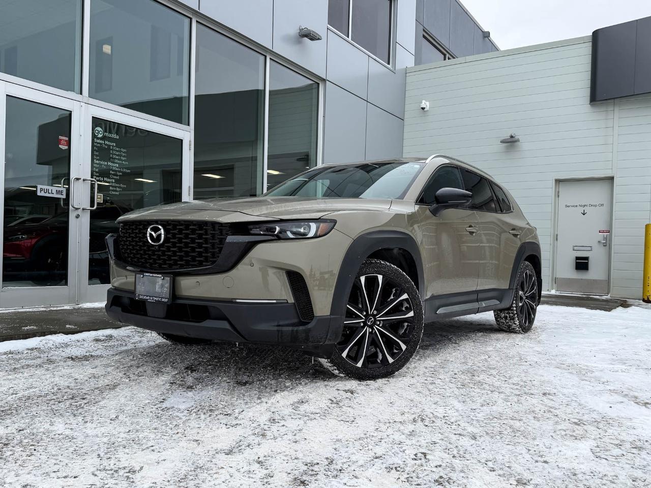 Discover the perfect blend of style, performance, and advanced technology with this pre-owned 2023 Mazda CX-50 GT AWD. Powered by a spirited 2.5L SKYACTIV-G 4-cylinder engine and smooth 6-speed automatic transmission, it delivers confident All-Wheel Drive traction and a refined driving experience.Step inside to enjoy premium leather-trimmed heated and ventilated front seats, dual-zone automatic climate control, and a breathtaking Bose 12-speaker sound system for your favorite tunes. The advanced safety suite offers lane departure prevention, blind spot monitoring, and adaptive cruise control with stop & go  keeping you connected and protected on every journey.With sleek 20-inch alloy wheels, LED adaptive headlights, power liftgate, and smart device wireless mirroring, this CX-50 GT AWD stands out in both capability and convenience. Ready for your next adventure, it combines Mazdas signature driving dynamics with comfort and technology tailored for you.Experience it today at Go Mazda  where innovation and passion meet the road. Schedule your test drive now!Go Mazda is an AMVIC licensed business.