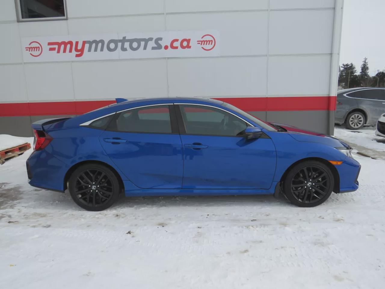 2020 Honda Civic SI Sedan SI | Low Km | Safety Certified | One Owner | Clean Title | No Accidents | Manual Transmission | Alloy Rims | Sunroof | Push Button Start | Digital Touchscreen | Reverse Camera | Collision Avoidance | Lane Assist | Heated Seats | Wireless Charging Photo