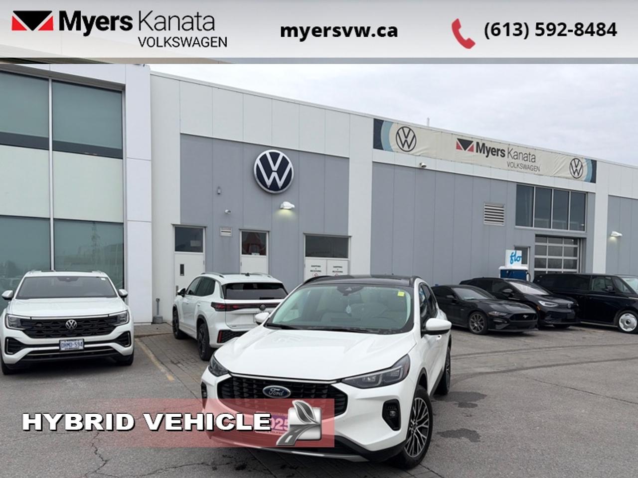 <b>Navigation,  Adaptive Cruise Control,  360 Camera,  Hybrid,  Remote Start!</b><br> <br>  Compare at $42378 - Our Price is just $41144! <br> <br>In the city or in the forest, this Ford Escape is built to get you over any terrain with confidence and comfort. This 2025 Ford Escape is for sale today in Kanata. <br> <br>This Ford Escape was built for an active lifestyle and offers plenty of options for you to hit the road in your own individual style. Whether you need a family SUV for soccer practice, a capable adventure vehicle, or both, the versatile Ford Escape has you covered. Built for those who live on the go, the 2025 Ford Escape is made to be unstoppable. This SUV has 23,648 km. Its Star White Meta in colour and is completely accident free based on the <a href=https://vhr.carfax.ca/?id=Fz3KkzeZxdRL1RadfwhzHlFw2At5c2t6 target=_blank>CARFAX Report</a>. It has an Automatic transmission and is powered by a smooth engine. <br> <br> Our Escapes trim level is Platinum. This Escape Platinum is a significant step up, with upgrades such as inbuilt navigation, adaptive cruise control, a surround camera system and evasive steering assist. The amazing standard features continue with heated ActiveX synthetic leather seats, a heated leatherette steering wheel, simulated wood interior trim, remote engine start, and an expansive 13.2-inch infotainment screen with wireless Apple CarPlay and Android Auto, SiriusXM satellite radio, and FordPass Connect 4G mobile hotspot internet access. Safety features include blind spot detection, lane keeping assist with lane departure warning, evasive steering assist, forward and rear collision mitigation, and front and rear parking sensors. Additional features include a power liftgate for rear cargo access, aluminum wheels, roof rack rails, LED headlights with automatic high beams, a keypad for extra security, and so much more. This vehicle has been upgraded with the following features: Navigation, Adaptive Cruise Control, 360 Camera, Hybrid, Remote Start, Heated Seats, Apple CarPlay.<br> To view the original window sticker for this vehicle view this <a href=http://www.windowsticker.forddirect.com/windowsticker.pdf?vin=1FMCU9JZ2SUA12886 target=_blank>http://www.windowsticker.forddirect.com/windowsticker.pdf?vin=1FMCU9JZ2SUA12886</a>. <br/><br> <br>To apply right now for financing use this link: <a href=https://www.myersvw.ca/en/form/new/financing-request-step-1/44 target=_blank>https://www.myersvw.ca/en/form/new/financing-request-step-1/44</a><br><br> <br/><br>Backed by Myers Exclusive NO Charge Engine/Transmission for life program lends itself for your peace of mind and you can buy with confidence. Call one of our experienced Sales Representatives today and book your very own test drive! Why buy from us? Move with the Myers Automotive Group since 1942! We take all trade-ins - Appraisers on site - Full safety inspection including e-testing and professional detailing prior delivery! <br><br>*LIFETIME ENGINE TRANSMISSION WARRANTY NOT AVAILABLE ON VEHICLES MARKED AS-IS, VEHICLES WITH KMS EXCEEDING 140,000KM, VEHICLES 8 YEARS & OLDER, OR HIGHLINE BRAND VEHICLES (eg.BMW, INFINITI, CADILLAC, LEXUS...). FINANCING OPTIONS NOT AVAILABLE ON VEHICLES MARKED AS-IS OR AS-TRADED.<br> Come by and check out our fleet of 50+ used cars and trucks and 160+ new cars and trucks for sale in Kanata.  o~o