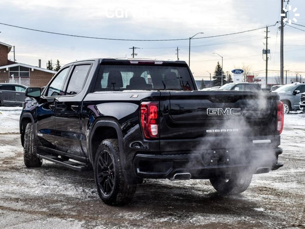 2024 GMC Sierra 1500 Elevation 4WD Crew Cab 147" 5.3L 5 passengers with captain chair Photo