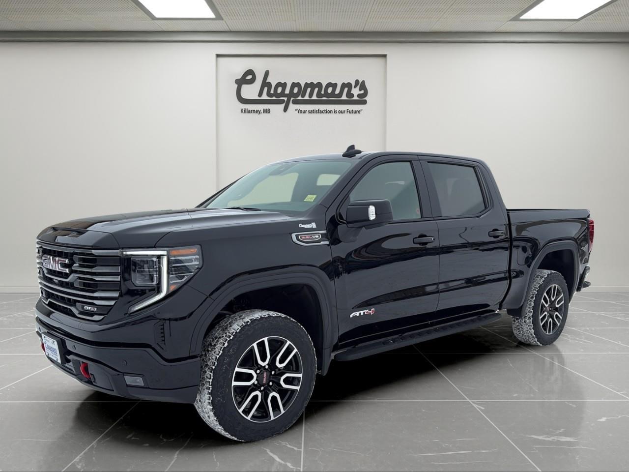 <p>The 2026 GMC Sierra 1500 AT4 Crew Cab 4WD delivers uncompromising off-road capability paired with premium comfort and advanced technology. Finished in <strong>Onyx Black</strong> with a <strong>Jet Black and Kalahari interior</strong>, this AT4 is powered by the <strong>6.2L Ecotec3 V8</strong> and a <strong>10-speed automatic transmission</strong>, making it a high-performance full-size pickup built for both rugged terrain and refined daily driving.</p><p><strong>Performance & Capability</strong></p><p>Serious power and off-road hardware designed for demanding conditions and confident towing.</p><ul><li><p>6.2L Ecotec3 V8 Engine</p></li><li><p>10-Speed Automatic Transmission</p></li><li><p>4WD with 2-Speed Autotrac Transfer Case</p></li><li><p>Automatic Locking Rear Differential</p></li><li><p>AT4 Off-Road Suspension with 2" Lift and Monotube Shocks</p></li><li><p>Skid Plates</p></li><li><p>Hill Descent Control</p></li><li><p>Trailer Brake Controller</p></li><li><p>In-Vehicle Trailering App</p></li><li><p>120V AC Power Outlets (Instrument Panel and Cargo Bed)</p></li><li><p>Active Exhaust System</p></li></ul><p><strong>Interior Comfort & Convenience</strong></p><p>A premium AT4 cabin built for long drives, rough roads, and everyday comfort.</p><ul><li><p>Heated and Ventilated Front Bucket Seats</p></li><li><p>Heated Second-Row Outboard Seats</p></li><li><p>10-Way Power Front Seats</p></li><li><p>Driver Seat and Mirror Memory</p></li><li><p>Heated Leather-Wrapped Steering Wheel</p></li><li><p>Power Tilt and Telescoping Steering Column</p></li><li><p>Adaptive Cruise Control</p></li><li><p>Wireless Charging</p></li><li><p>Bose Premium Sound System</p></li><li><p>Premium Floor Liners</p></li></ul><p><strong>Technology & Connectivity</strong></p><p>Advanced displays and trailering technology keep you informed and connected.</p><ul><li><p>GMC Premium Infotainment System</p></li><li><p>13.4" Diagonal Colour Touchscreen</p></li><li><p>Google Built-In with Navigation Capability</p></li><li><p>Wireless Apple CarPlay</p></li><li><p>Wireless Android Auto</p></li><li><p>12.3" Digital Driver Information Centre</p></li><li><p>Head-Up Display</p></li><li><p>Rear Camera Mirror</p></li><li><p>Bed View Camera</p></li><li><p>Keyless Open and Remote Start</p></li><li><p>OnStar Basics (Up to 8 Years)</p></li><li><p>SiriusXM Audio (Trial Included)</p></li></ul><p><strong>Safety & Driver Assistance</strong></p><p>Comprehensive safety technology designed to support confidence on and off the road.</p><ul><li><p>GMC Pro Safety</p></li><li><p>Automatic Emergency Braking</p></li><li><p>Forward Collision Alert</p></li><li><p>Front Pedestrian Braking</p></li><li><p>Lane Keep Assist with Lane Departure Warning</p></li><li><p>Following Distance Indicator</p></li><li><p>IntelliBeam Automatic High Beams</p></li><li><p>Front and Rear Park Assist</p></li><li><p>Trailer Side Blind Zone Alert</p></li><li><p>Rear Cross Traffic Braking</p></li><li><p>Rear Pedestrian Alert</p></li><li><p>HD Surround Vision</p></li><li><p>Safety Alert Seat</p></li><li><p>Tire Pressure Monitoring with Tire Fill Alert</p></li><li><p>Teen Driver Technology</p></li></ul><p><strong>Exterior Highlights</strong></p><p>Bold AT4 styling paired with functional, trail-ready features.</p><ul><li><p>20" Machined Aluminum Wheels with Carbon Grey Metallic Accents</p></li><li><p>All-Terrain Tires</p></li><li><p>Spray-On Bedliner</p></li><li><p>GMC MultiPro Tailgate</p></li><li><p>LED Cargo Area Lighting</p></li><li><p>Power Folding Heated Mirrors with Driver-Side Auto-Dimming</p></li><li><p>LED Headlamps, Tail Lamps, and Fog Lamps</p></li><li><p>Rain-Sensing Wipers</p></li><li><p>Rear Window Defogger</p></li><li><p>Power Sunroof</p></li><li><p>Off-Road High-Clearance Steps</p></li></ul><p>2 Year/24,000 kilometer* Complimentary Oil Changes (2 total)</p><p>3 Year/60,000 kilometer* Base Warranty Coverage</p><p>5 Year/100,000 kilometer* Powertrain Component Warranty Coverage</p><p>5 Year/100,000 kilometer* Courtesy Transportation and 24/7 Roadside Assistance</p><p>6 Year/160,000 kilometer* Sheet Metal (Rust Through) Perforation Warranty Coverage</p><p>*Whichever Comes First.</p><p>Price Includes HD Flaps & 6 Tube Steps.</p><p>Price Includes Dealer Fee.</p><p>Price Excludes PST & GST.</p><p>Financing Options Available, Call For More Details.</p> <p><strong>*While every reasonable effort is made to ensure the accuracy of this information, we are not responsible for any error or omissions contained on these pages. Please verify any information in question with Chapman Motors Ltd.</strong></p>