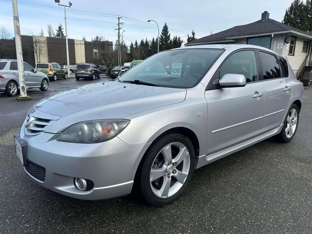 <p> <strong>2006 Mazda 3 Hatchback  Clean & Drives Great!</strong> </p><p> <strong>Details:</strong></p><ul><li><p> <strong>Year:</strong> 2006</p></li><li><p> <strong>Mileage:</strong> 265,928 km</p></li><li><p> <strong>Transmission:</strong> Automatic</p></li><li><p> <strong>Seats:</strong> 5 passengers</p></li></ul><p> <strong>Features:</strong></p><ul><li><p> Tilt Steering</p></li><li><p> Air Conditioning</p></li><li><p> Cruise Control</p></li><li><p> Power Windows, Locks & Mirrors</p></li><li><p> Sunroof</p></li><li><p> Clean Cloth Interior</p></li><li><p> Factory Alloy Wheels</p></li></ul><p> <strong>Clean vehicle  runs and drives great!</strong><br> Reliable hatchback with lots of space, great on gas, and perfect for daily driving.</p><p> <strong>Message for more info or to come see it!</strong></p><span id=jodit-selection_marker_1770337499507_8464371775409146 data-jodit-selection_marker=start style=line-height: 0; display: none;></span> <p><br></p><p>Excellent, Affordable Lubrico Warranty Options Available on ALL Vehicles!</p><p><span style=background-color: rgba(var(--bs-white-rgb),var(--bs-bg-opacity)); color: var(--bs-body-color); font-family: open-sans, -apple-system, BlinkMacSystemFont, "Segoe UI", Roboto, Oxygen, Ubuntu, Cantarell, "Fira Sans", "Droid Sans", "Helvetica Neue", sans-serif; font-size: var(--bs-body-font-size); font-weight: var(--bs-body-font-weight); text-align: var(--bs-body-text-align);>All Vehicles are Safety Inspected by a 3rd Party Inspection Service.&nbsp;</span><br><br>We speak English, French, German, Punjabi, Hindi and Urdu Language!&nbsp;</p><p><br>We are proud to have sold over 15,000 vehicles to our customers throughout B.C. from this same&nbsp;location in Surrey.<span id=jodit-selection_marker_1747949601815_3502933354387793 data-jodit-selection_marker=start style=line-height: 0; display: none;></span></p><p><br>What Makes Us Different? <br>All of our vehicles have been sent to us from new car dealerships. They are all trade-ins and we are a large remarketing centre for the lower mainland new car dealerships. We do not purchase vehicles at auctions or from private sales. <br> <br>Administration Fee of $450<br> <br>Disclaimer: <br>Vehicle options are inputted from a VIN decoder. As we make our best effort to ensure all details are accurate we can not guarantee the information that is decoded from the VIN. Please verify any options before purchasing the vehicle. <br> <br>B.C. Dealers Trade-In Centre <br>14458 104th Ave. <br>Surrey, BC <br>V3R1L9 <br>DL# 26220</p><p> <br> </p><p>6-0-4-5-8-5-1-8-3-1</p>