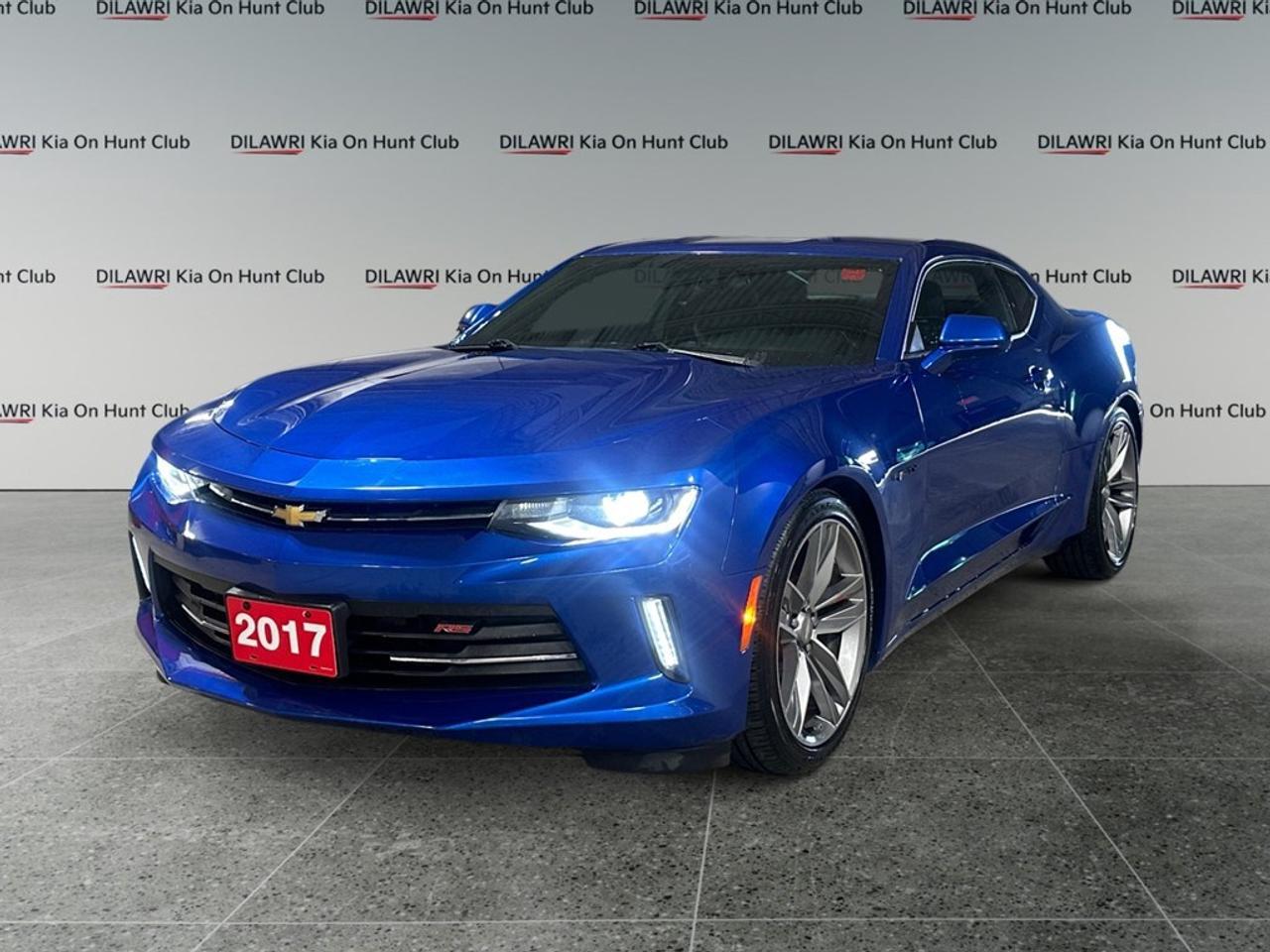 Get behind the wheel of the stunning 2017 Blue Chevrolet Camaro 1LT Coupe, complete with Rear Wheel Drive for those who crave precise handling and dynamic performance. This modern classic coupe boasts an eye-catching blue exterior paired with alloy wheels that elevate its sporty appeal. Inside, youll find a thoughtfully designed cockpit featuring a leather-wrapped steering wheel and shift knob, giving the interior a touch of luxury and comfort on every drive. Equipped with state-of-the-art technology, the Camaro offers features such as a backup camera, Bluetooth connection, smart device integration, and a Wi-Fi hotspot, ensuring you stay connected wherever you go. Safety and convenience come standard with brake assist, remote start, keyless entry, and cruise control, making every journey secure and enjoyable. Perfect for car enthusiasts seeking a blend of power and style, this Chevrolet Camaro is ready to impress. Reach out to our dealership today for more details and take this exceptional vehicle for a test drive. You wont want to miss this opportunity to own a piece of driving excellence.