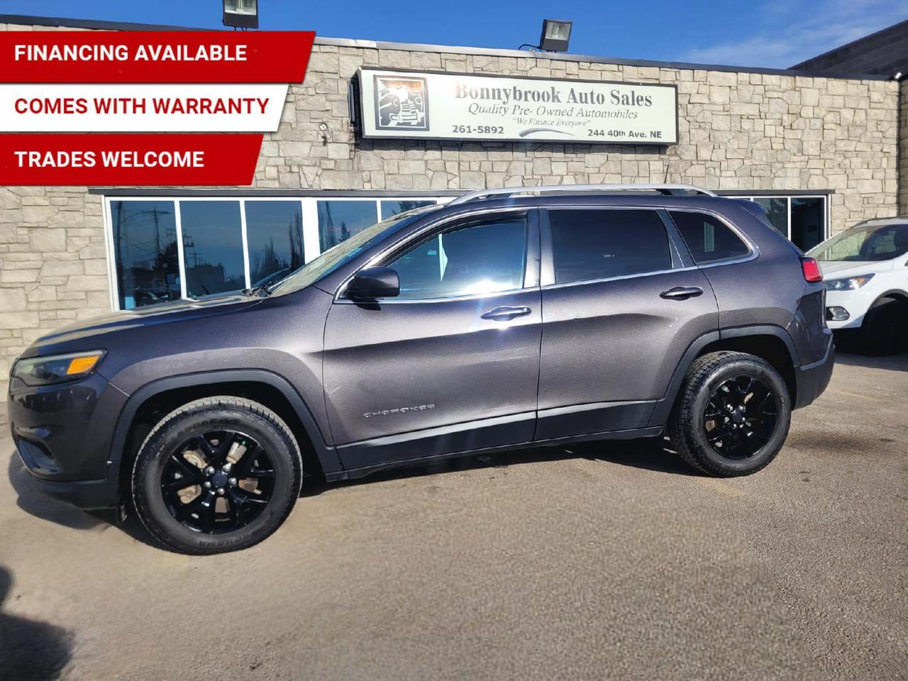 Need a vehicle that has style? Look at our Pre-Owned 2019 JEEP CHEROKEE NORTH 4X4  (Pictured in photo) Options including Heated Seats, Keyless Entry, Bluetooth, Cruise control, Power Mirrors, Power Locks, Power Windows. Power seat. Am/Fm stereo ,Rearview camera  /Air /Tilt /Cruise/ comes with 6 month power train warranty with options to extend. Smooth ride at a great price thats ready for your test drive. Fully inspected and given a clean bill of health by our technicians. Fully detailed on the interior and exterior so it feels like new to you. There should never be any surprises when buying a used car, thats why we share our Mechanical Fitness Assessment and Carfax with our customers, so you know what we know. Bonnybrook Auto sales is helping thousands find quality used vehicles at prices they can afford. If you would like to book a test drive, have questions about a vehicle or need information on finance rates, give our friendly staff a call today! Bonnybrook auto sales is proudly one of the few car dealerships that have been serving Calgary for over Twenty years. /TRADE INS WELCOMED/ Amvic Licensed Business.  Due to the recent increase for used vehicles.  We are in need of pre-owned vehicles. We give top dollar for your trades.  We also purchase all makes and models of vehicles.