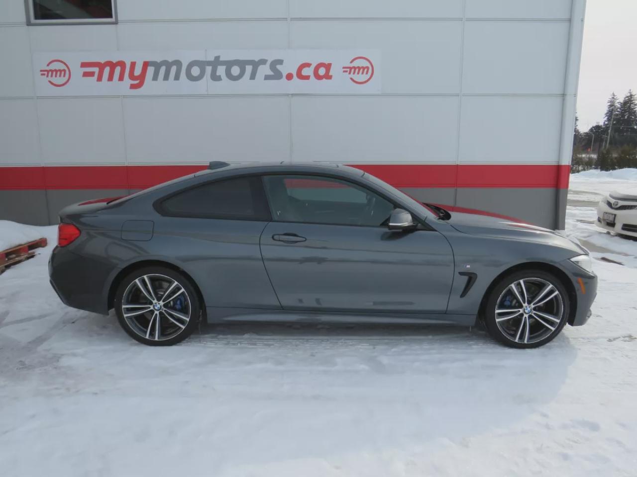 2016 BMW 4 Series 435i xDrive (**CLEAN TITLE/NO ACCIDENTS!!**SAFETY/CERTIFIED**AWD**ALLOY RIMS**FOG LIGHTS**LEATHER**NAVIGATION**SUNROOF**CD PLAYER**HEATED SEATS**PUSH BUTTON START**POWER SEATS**REVERSE CAMERA**DUAL CLIMATE CONTROL**RUBBER MATS**CRUISE CONTROL**BLUETOOTH** Photo