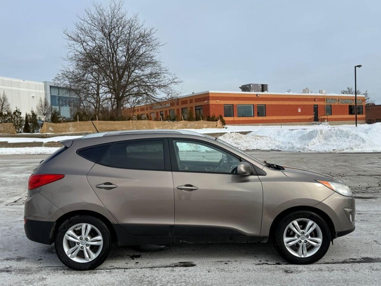 2011 Hyundai Tucson GLS 4dr Front-Wheel Drive Automatic Photo